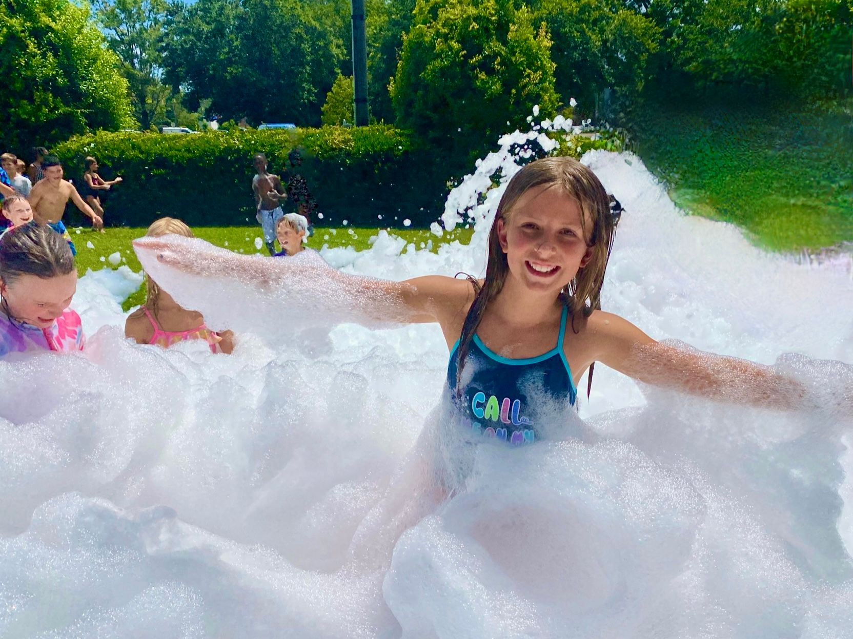 Kids playing in foam at a Foam Palooza party in Nocatee, FL