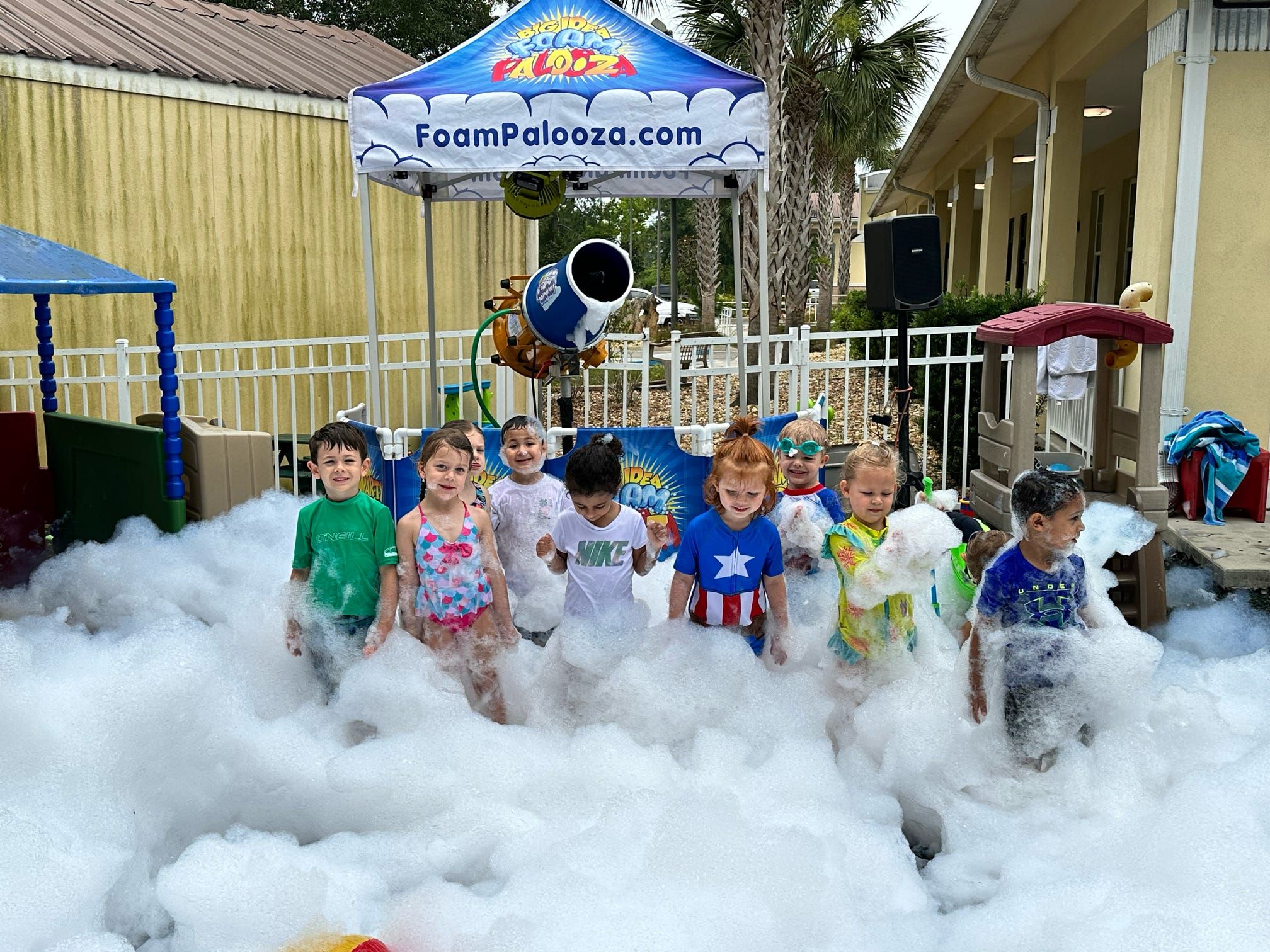 Kids playing in foam at a Foam Palooza party in Winter Park, FL