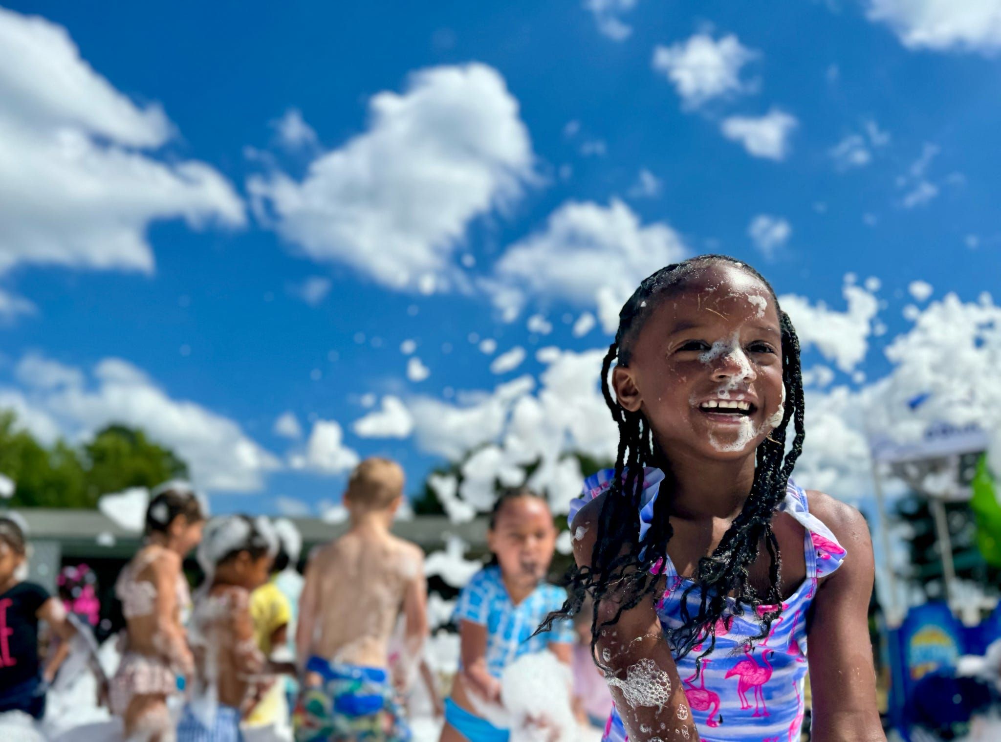 Kids playing in foam at a Foam Palooza party in Powder Springs, GA