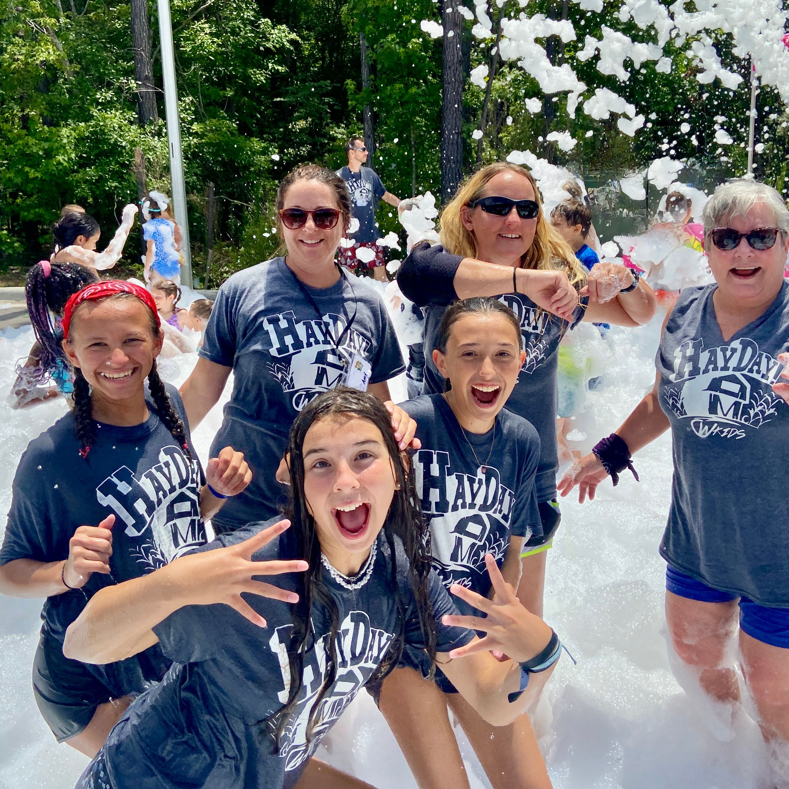 Kids playing in foam at a Foam Palooza party in South Tampa, FL