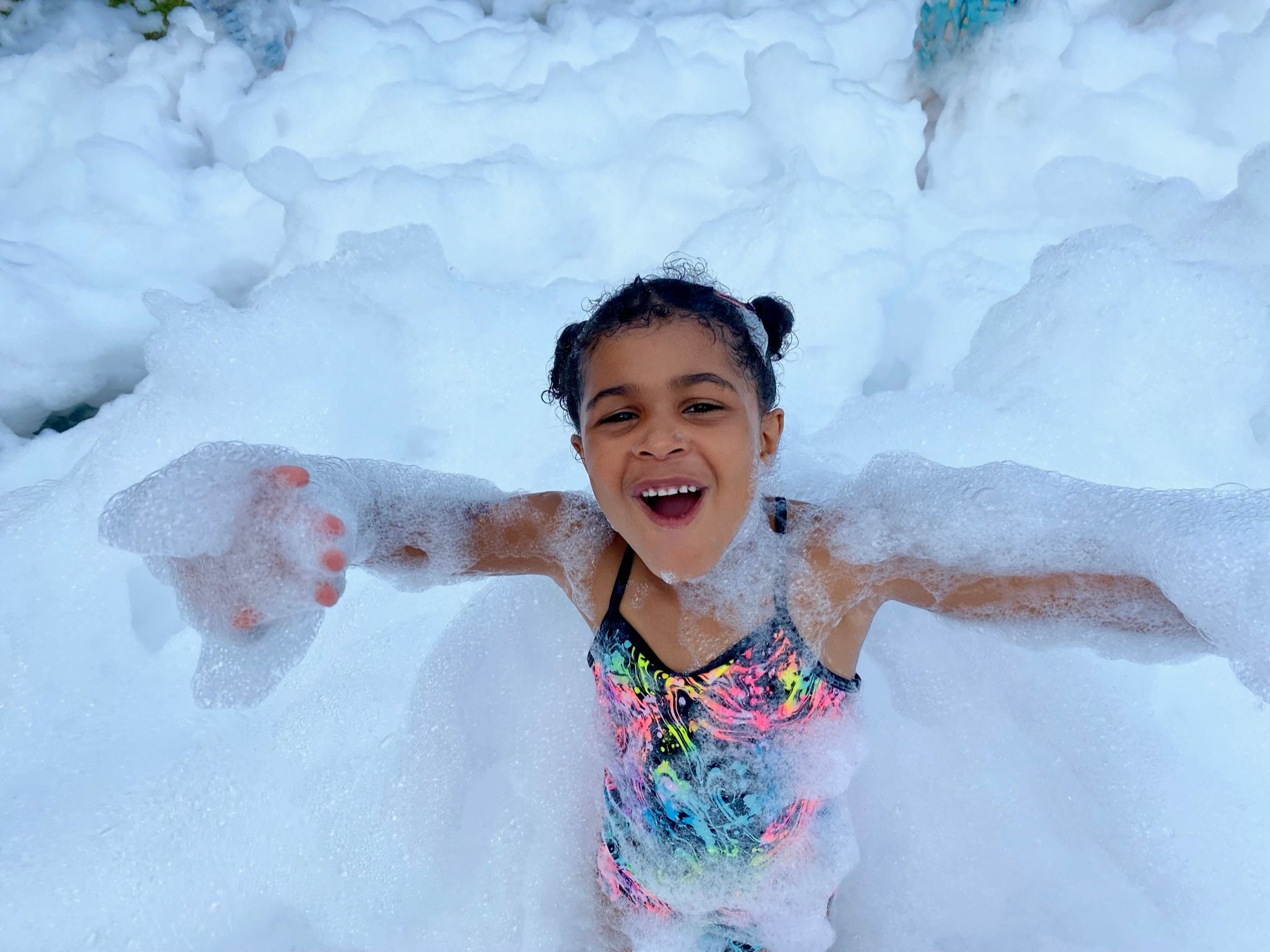 Kids playing in foam at a Foam Palooza party in Jacksonville Beach, FL