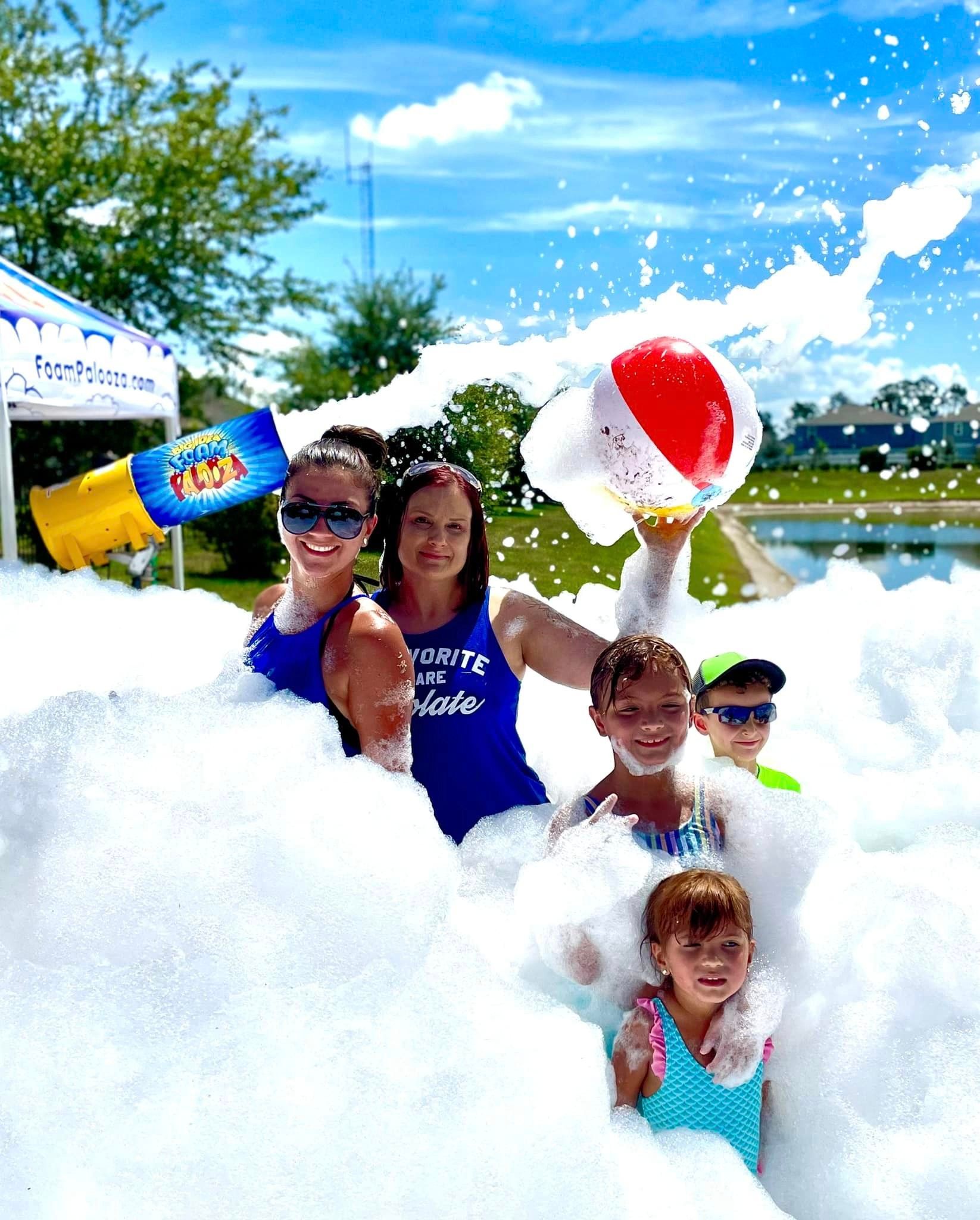 Kids playing in foam at a Foam Palooza party in Woodstock, GA