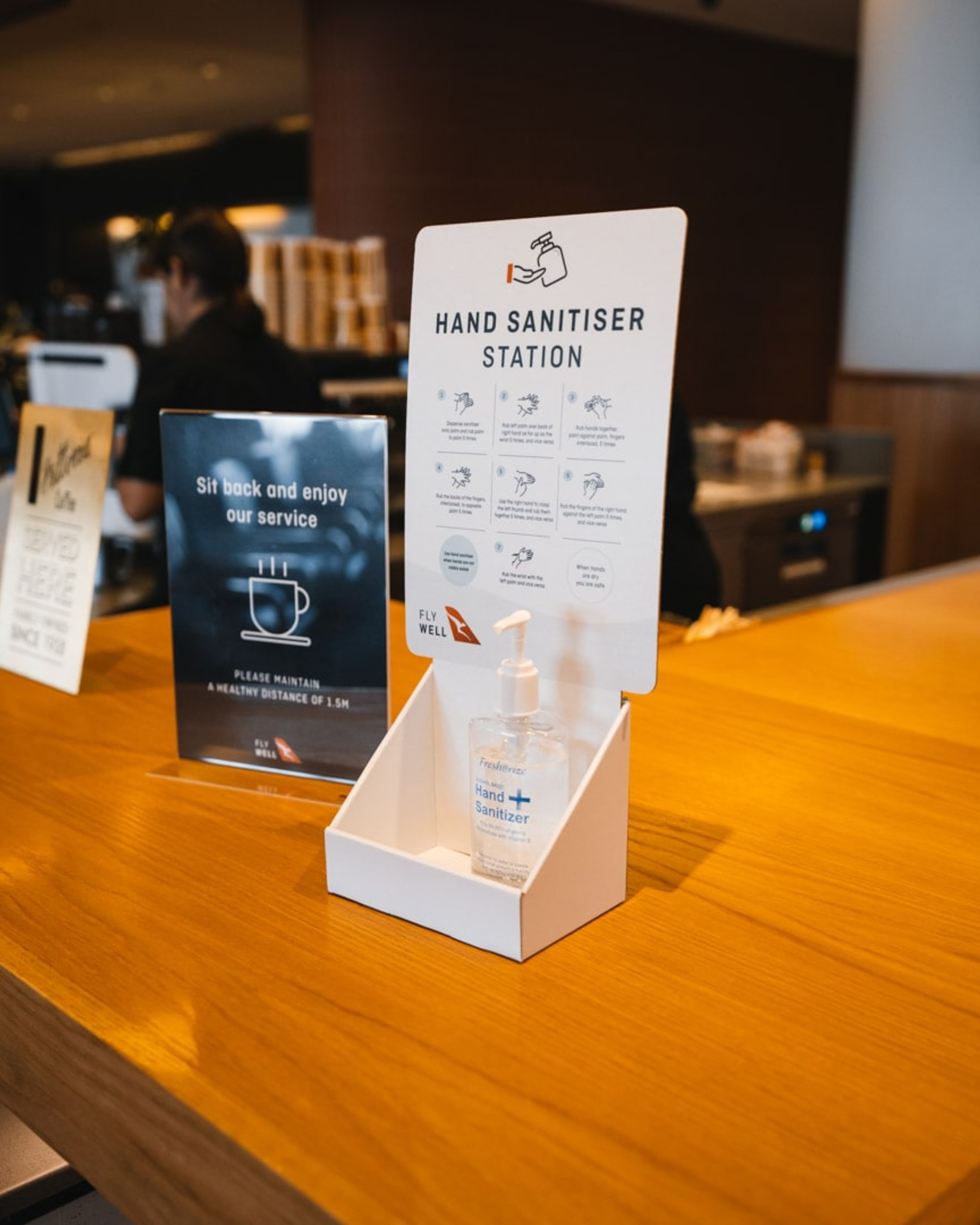 The New Qantas Business Lounge Experience Hand Sanitiser Station