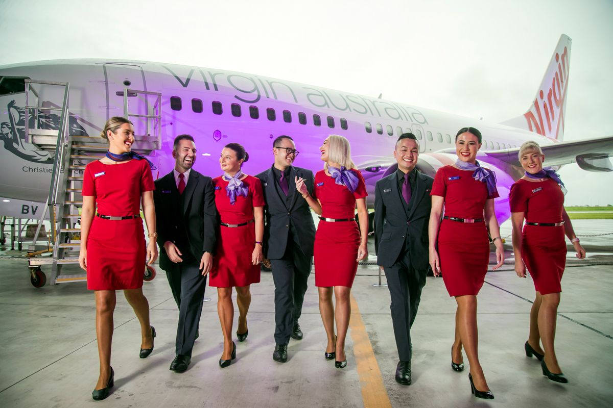 Virgin Australia crew walk in front of aircraft.jpg