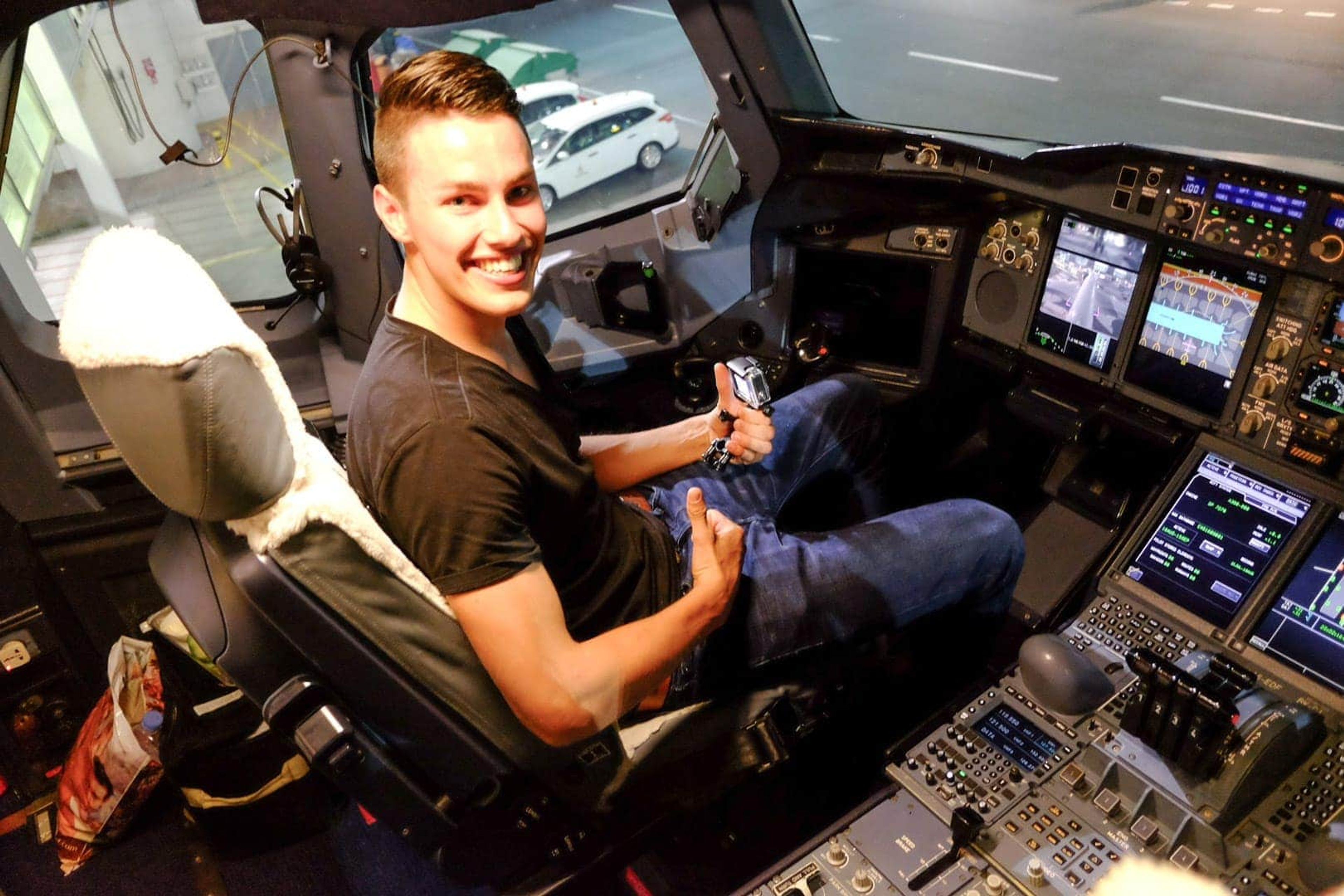 person in the airplane cockpit