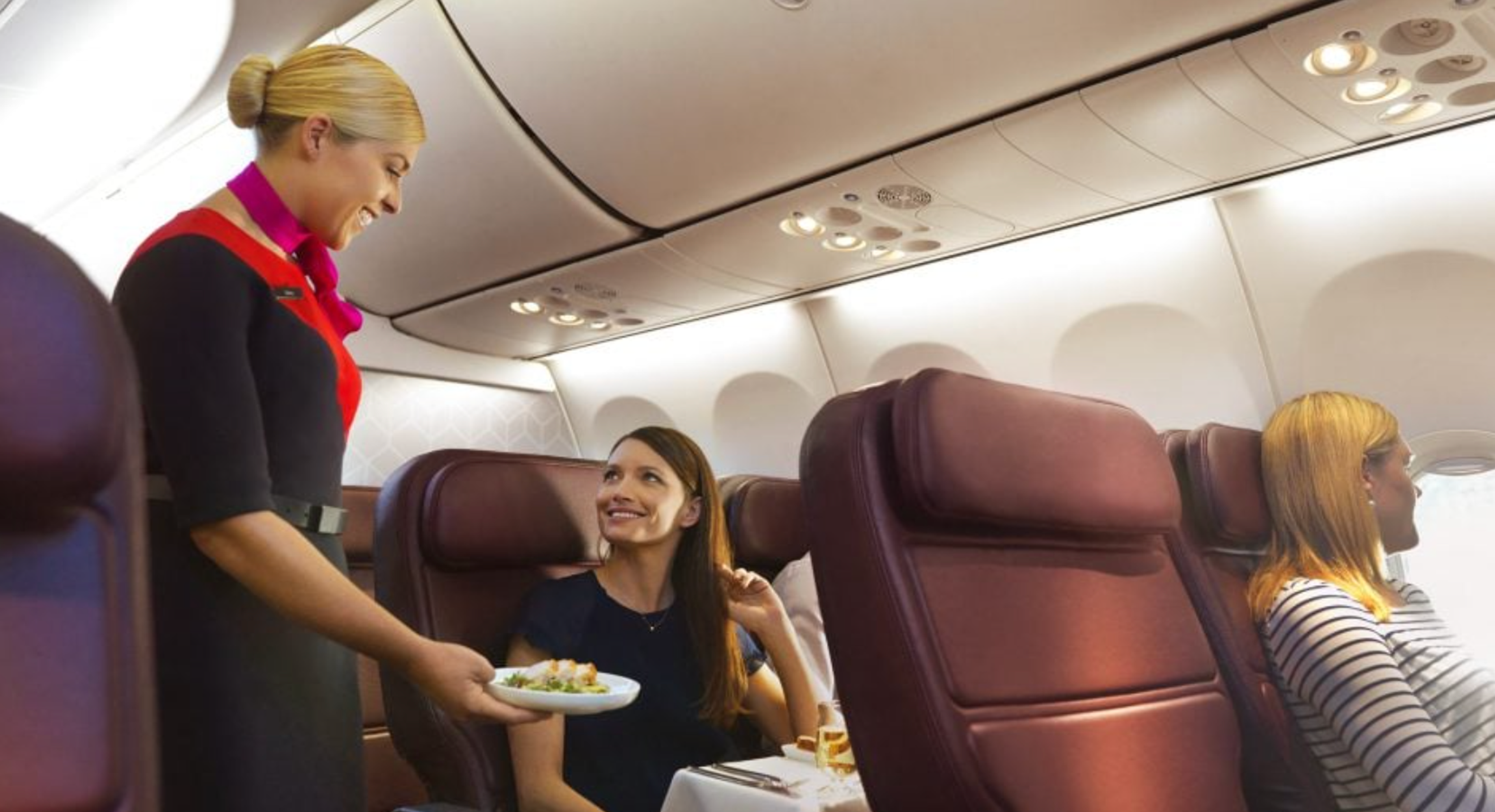 Flight Attendant serving delicious food