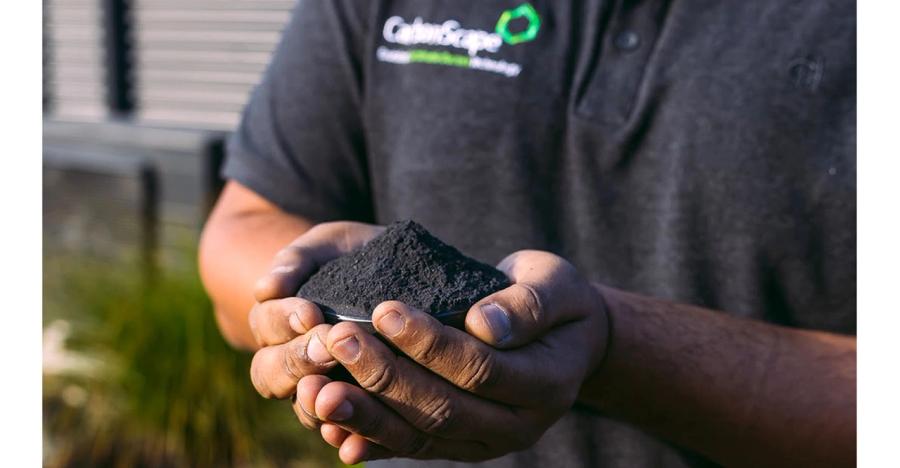 Person holding CarbonScape renewable biographite
