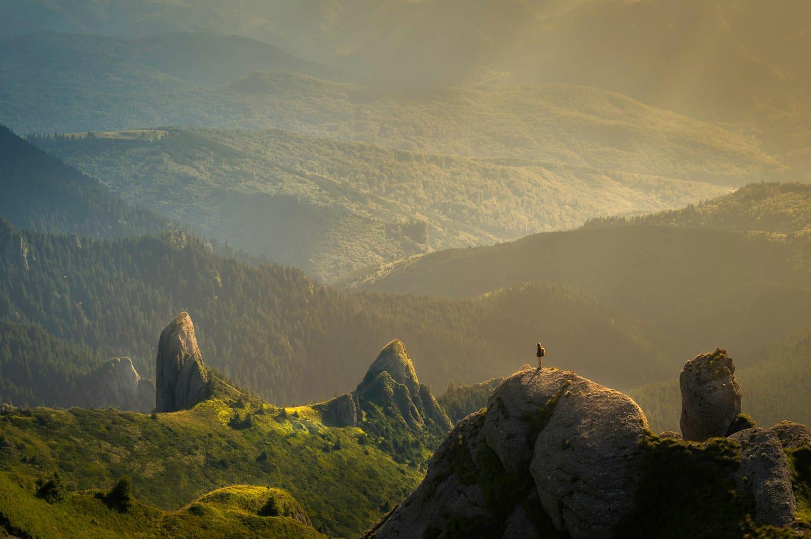 Sunlight breaking over a mountain landscape