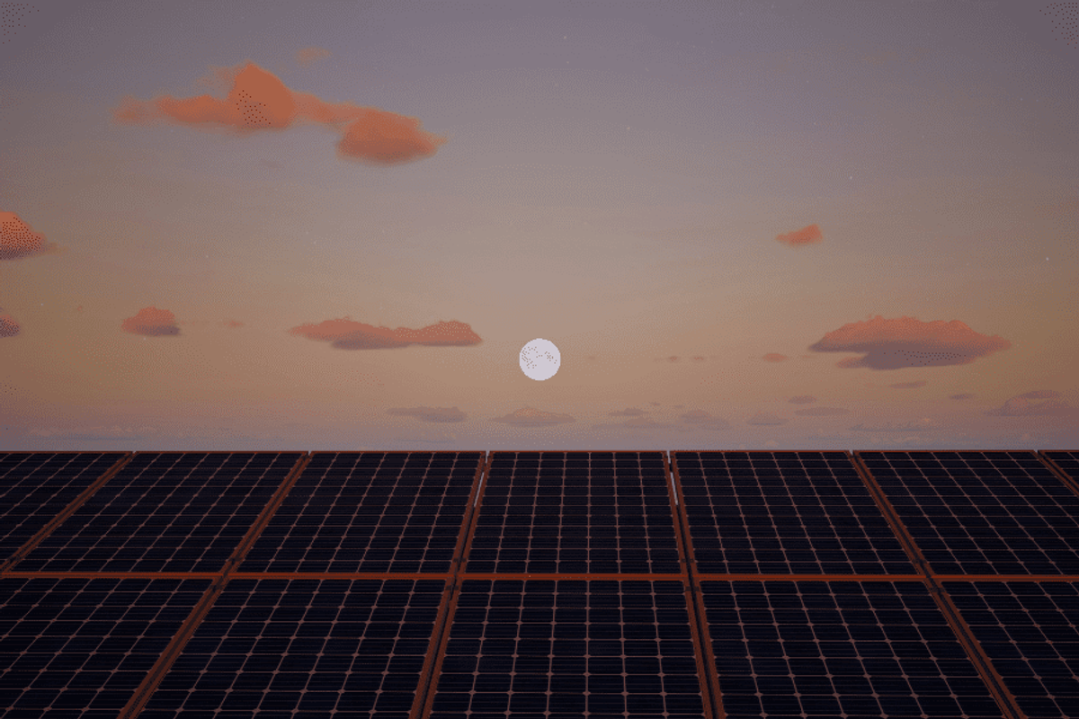 Moon at dusk over solar panels