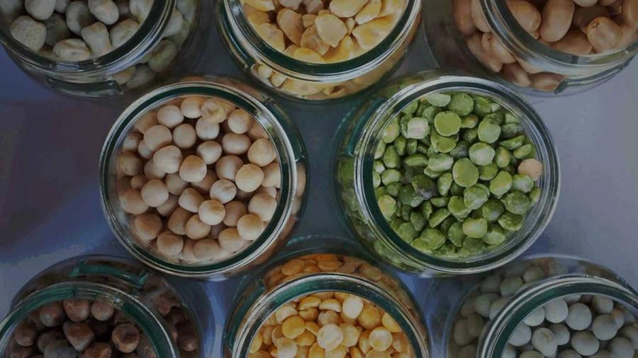 Top down photo of jars containing pulses.