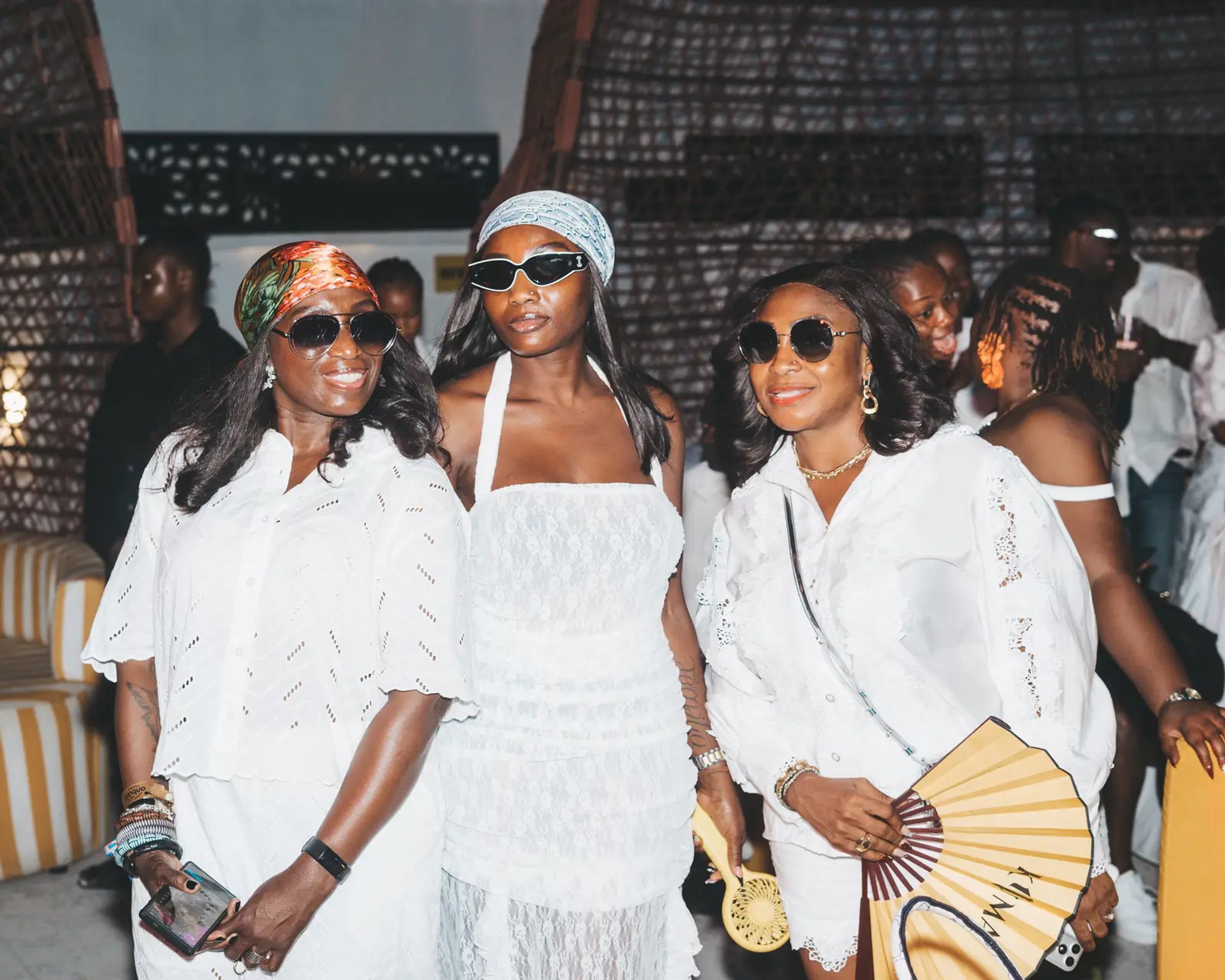 Three guests dressed in white