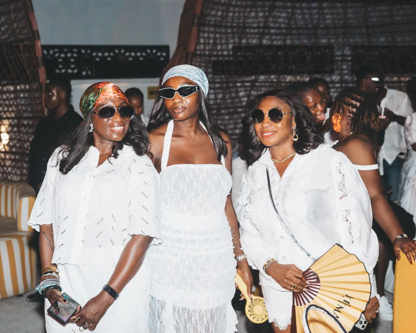 Three guests dressed in white