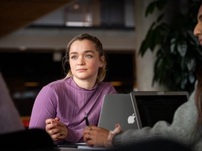 A pondering young woman