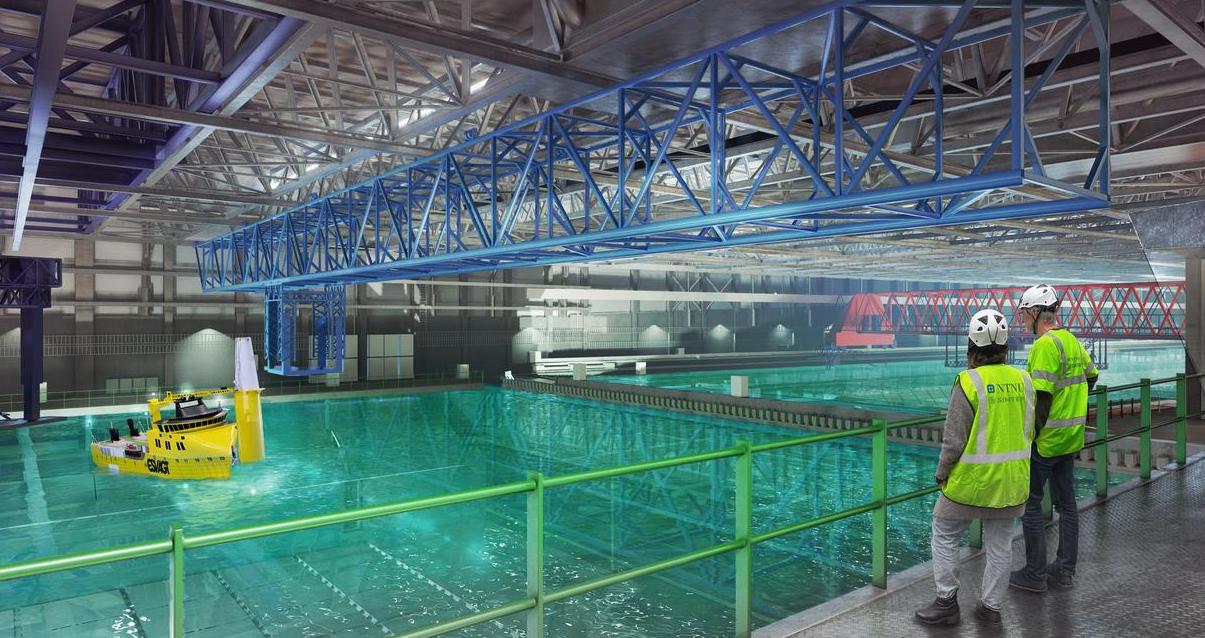 A water basin laboratory, related to maritime or offshore technology. The image features a large, industrial space with a water basin, for testing vessels and marine equipment, with workers in safety gear overseeing the operation. There's a focus on both practical and technical aspects, such as overhead cranes and a computer-controlled section.