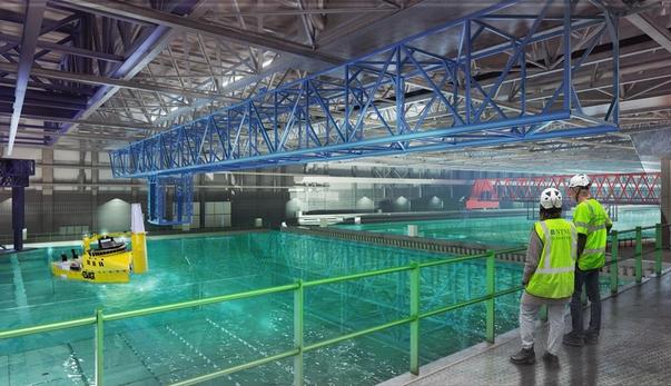 A water basin laboratory, related to maritime or offshore technology. The image features a large, industrial space with a water basin, for testing vessels and marine equipment, with workers in safety gear overseeing the operation. There's a focus on both practical and technical aspects, such as overhead cranes and a computer-controlled section.