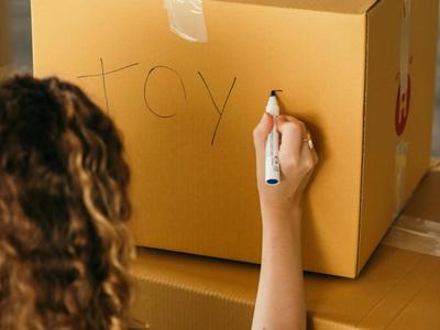 Girl labeling box
