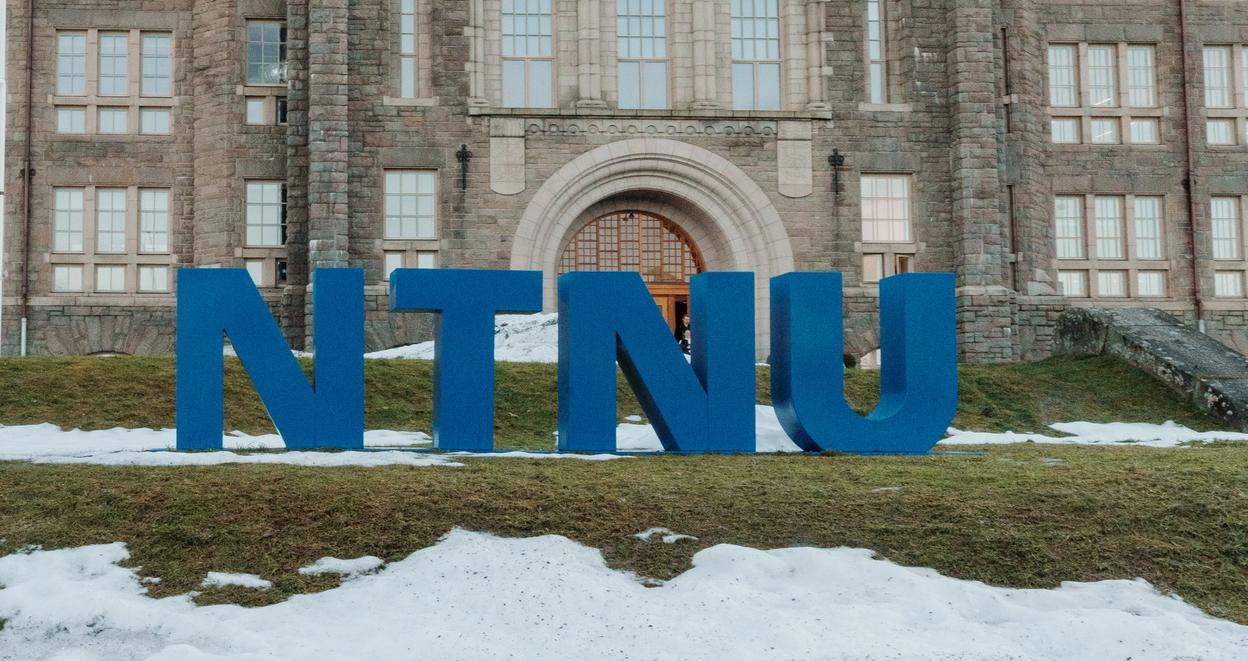 NTNU main building entrance with NTNU letters in front