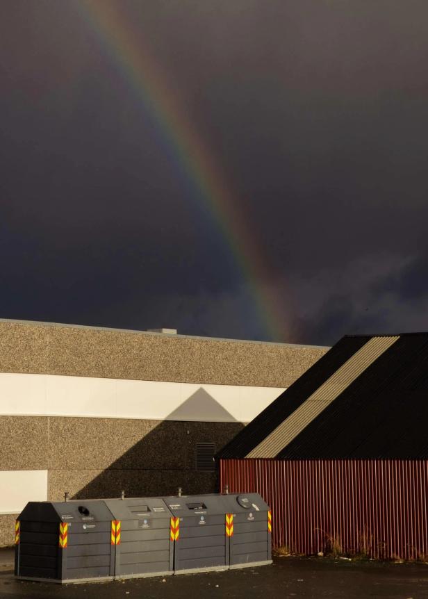 A rainbow on a dark sky