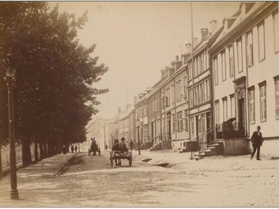 Old photo from Kjøpmannsgata street in Trondheim. Horse and Carriage. 1893.