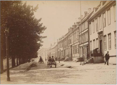 Old photo from Kjøpmannsgata street in Trondheim. Horse and Carriage. 1893.