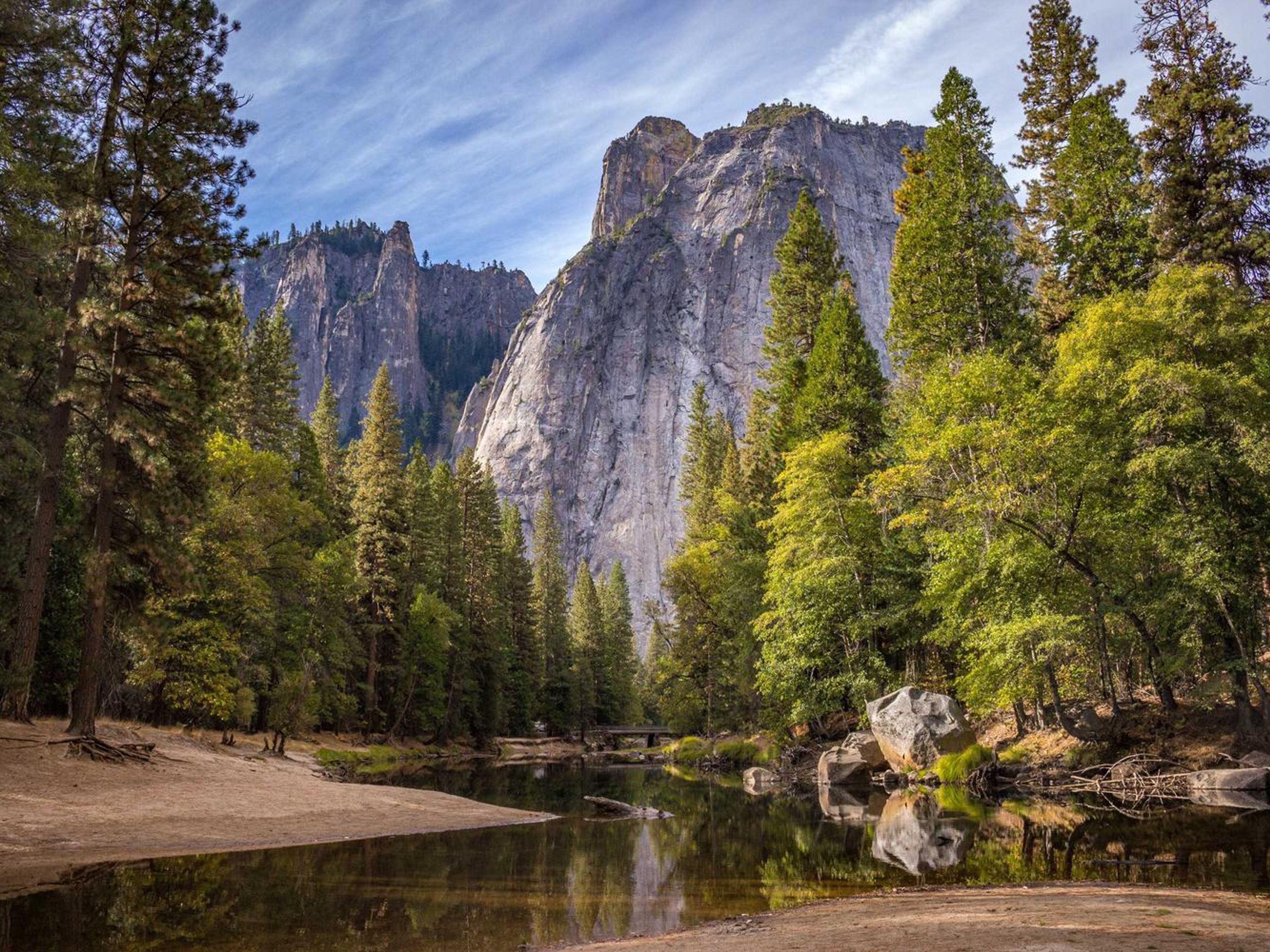 Maintenance worker checking a water reuse control panel