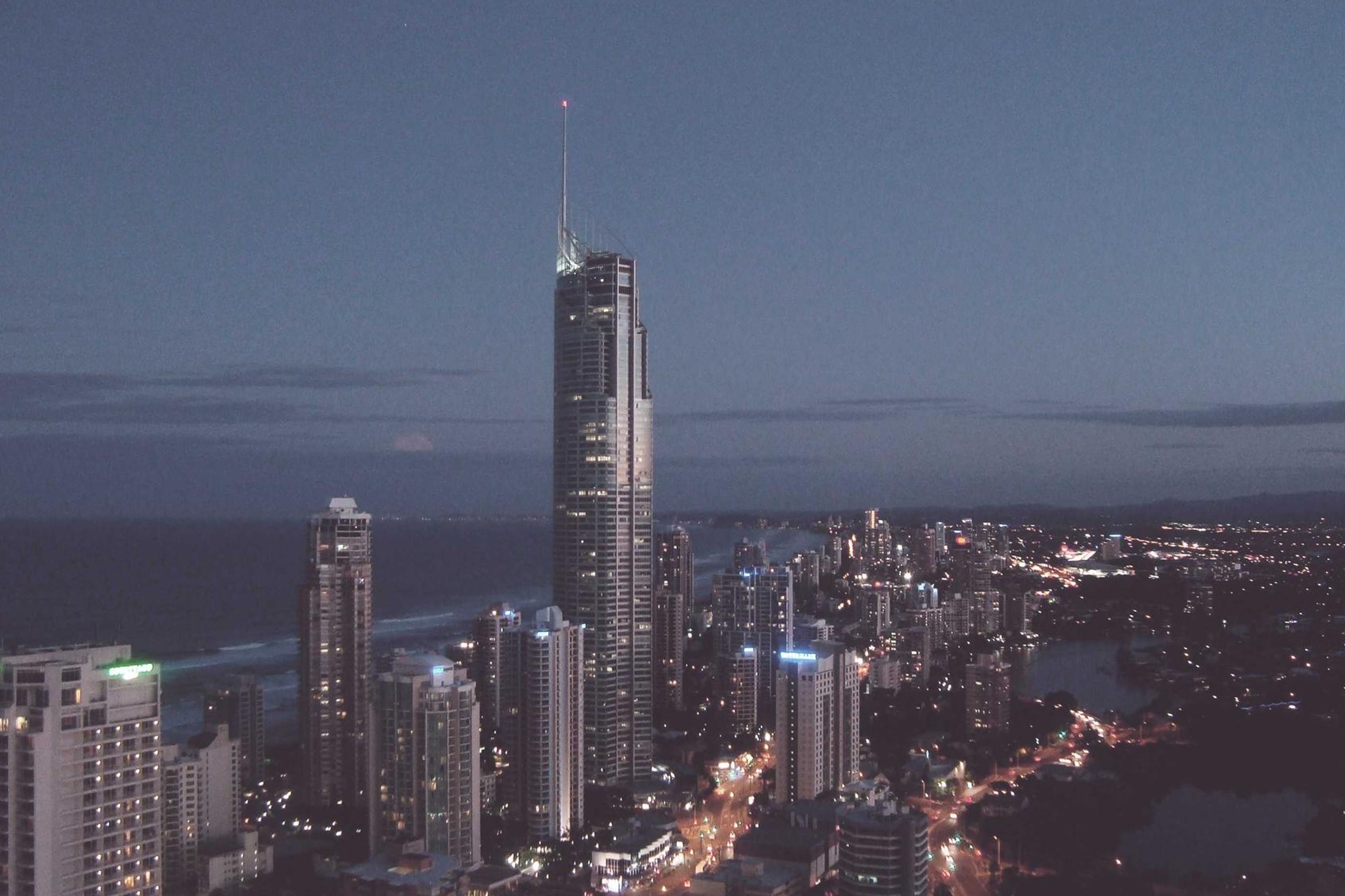 Passenger train arriving at a modern station platform