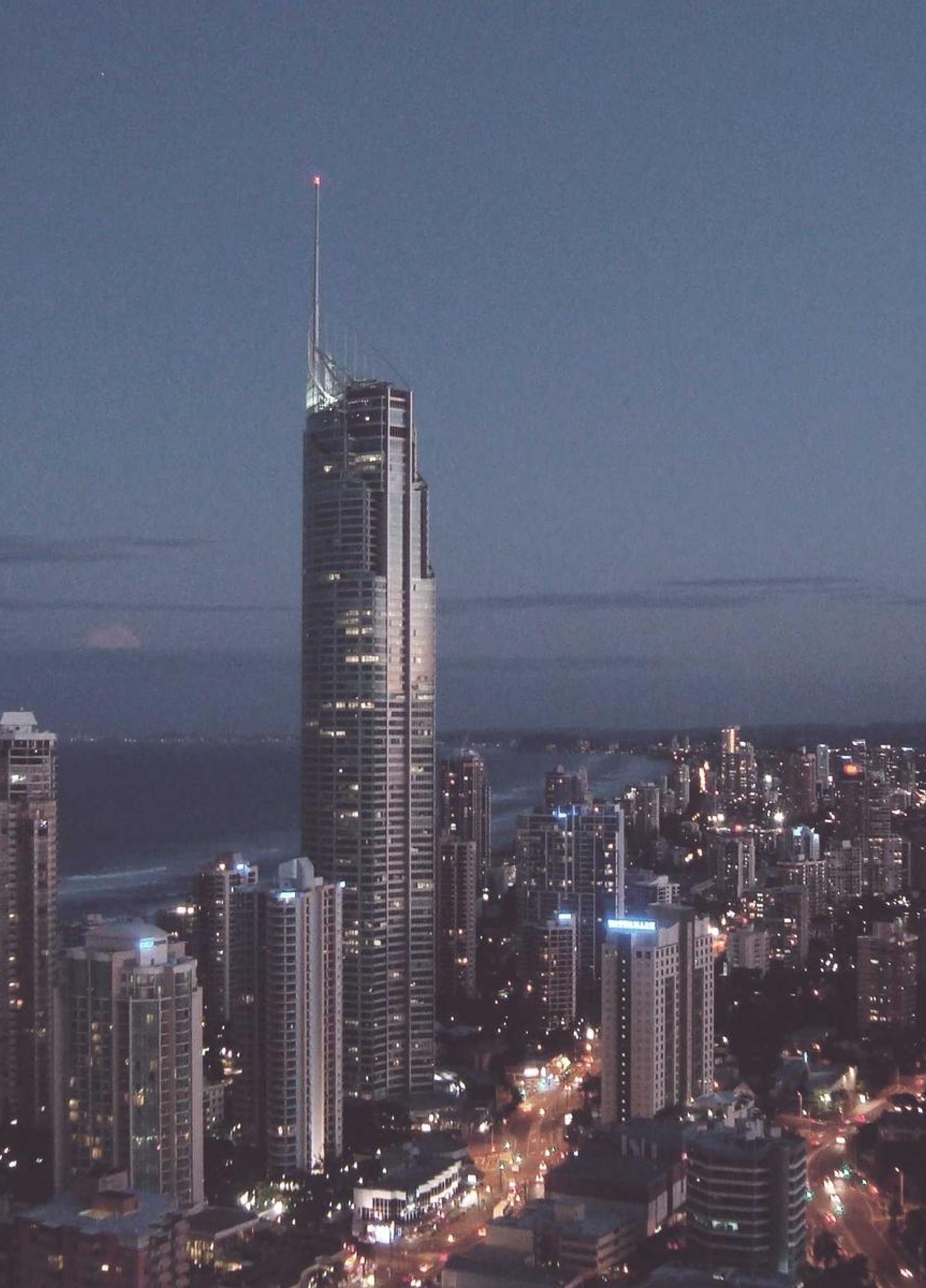 Passenger train arriving at a modern station platform