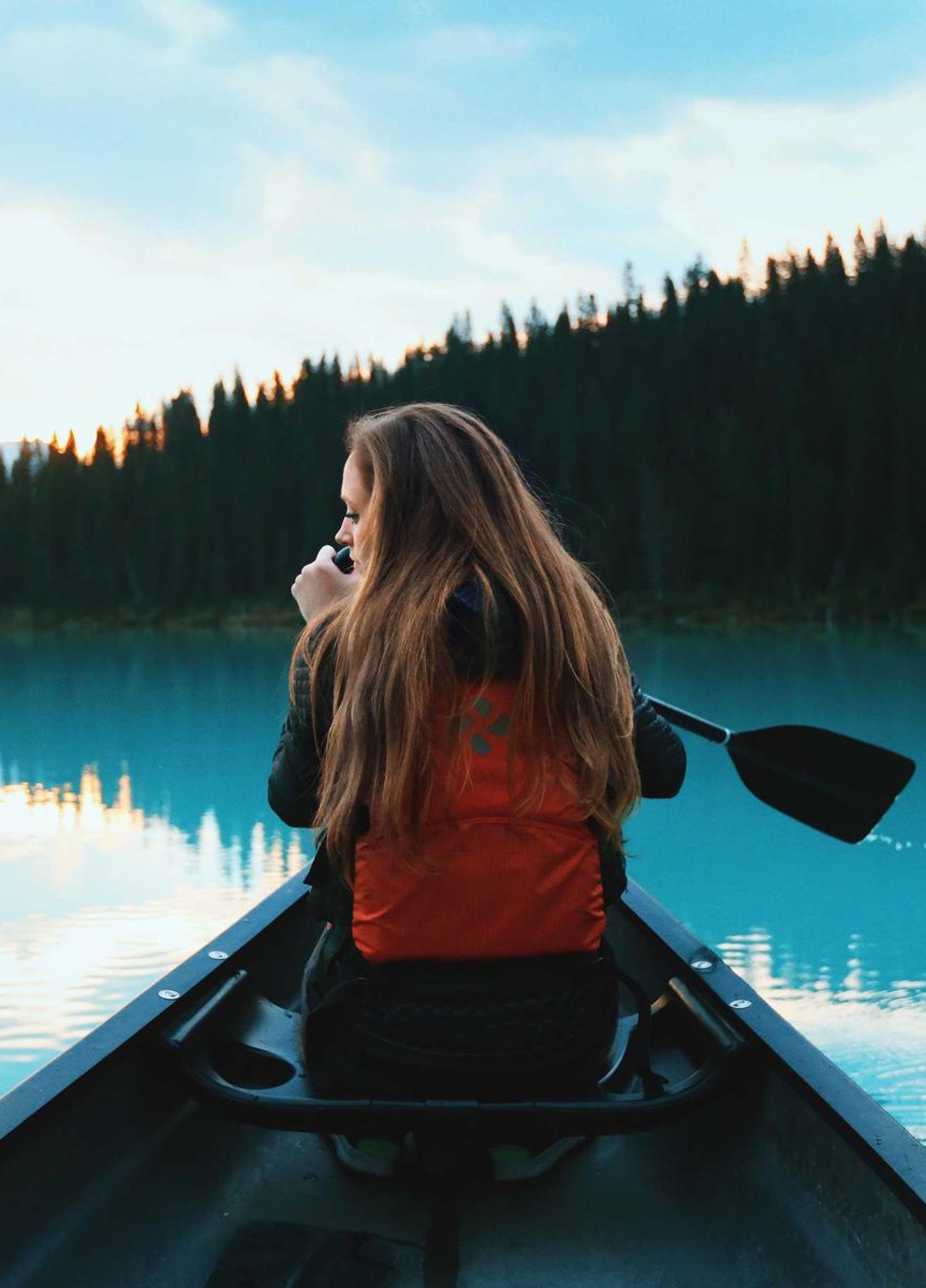 Transmission lines at sunset near a rural town