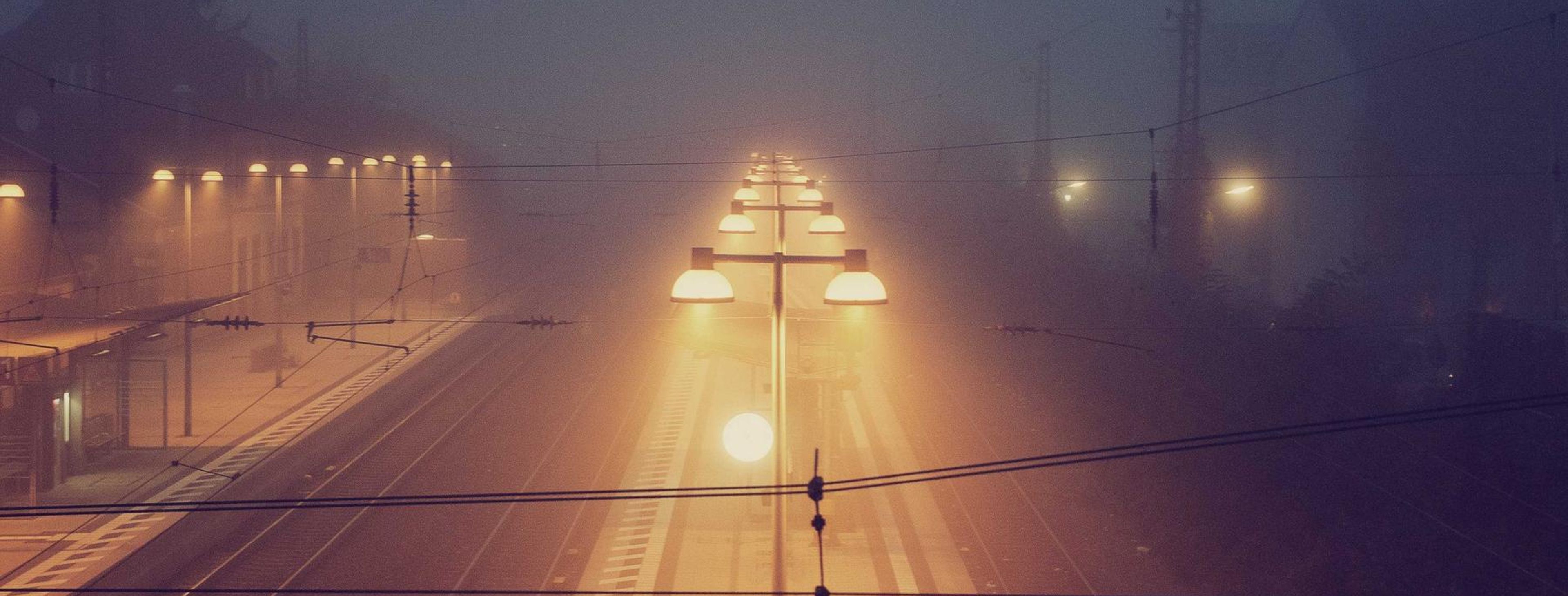 Row of neighborhood storefronts with rooftop solar panels