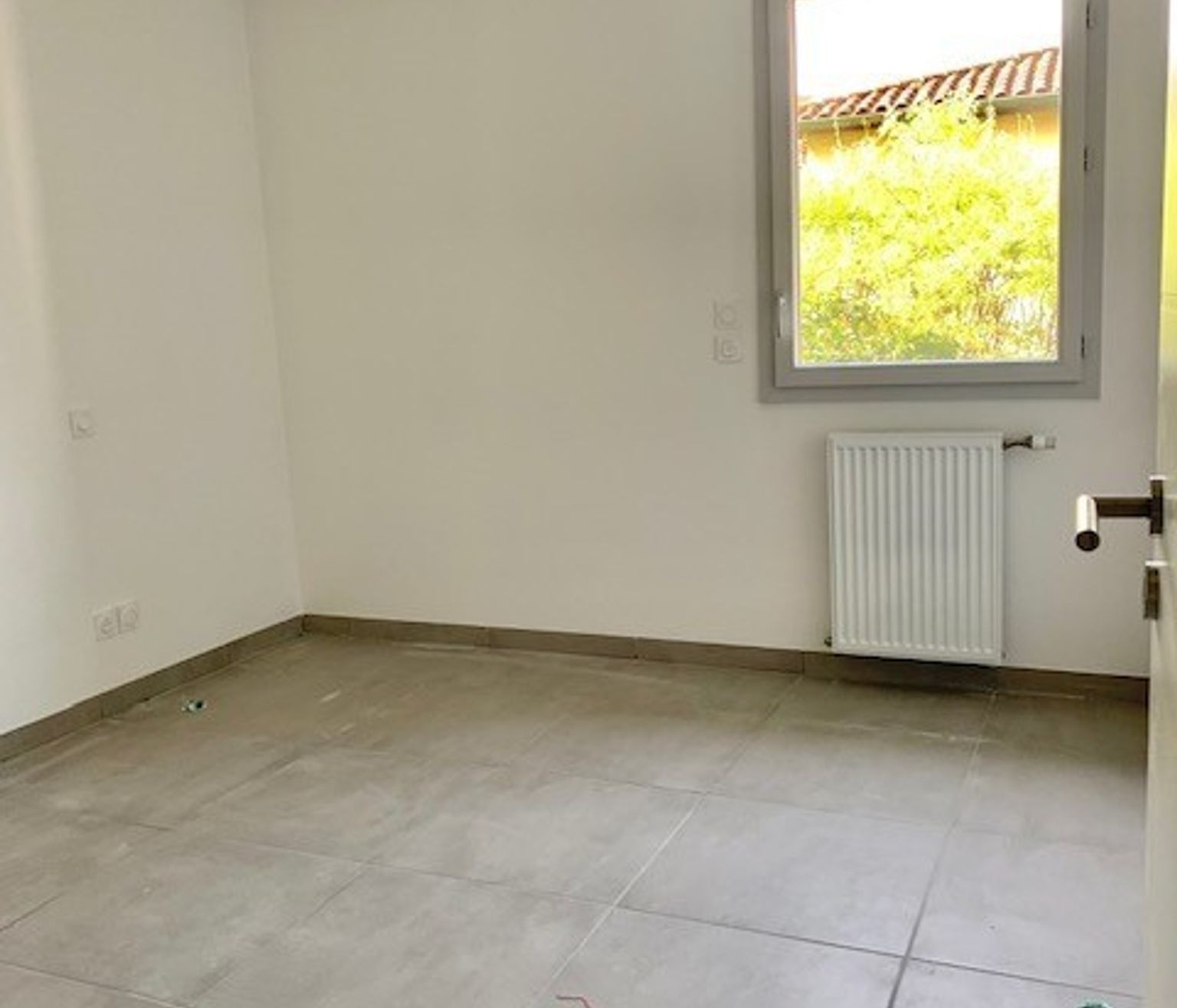 Location charmant T3 de 61 m² avec terrasse et place de parking