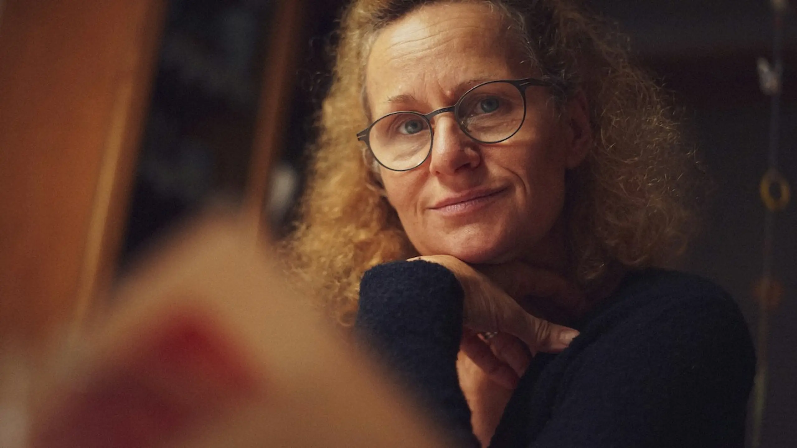 A woman looking at the camera