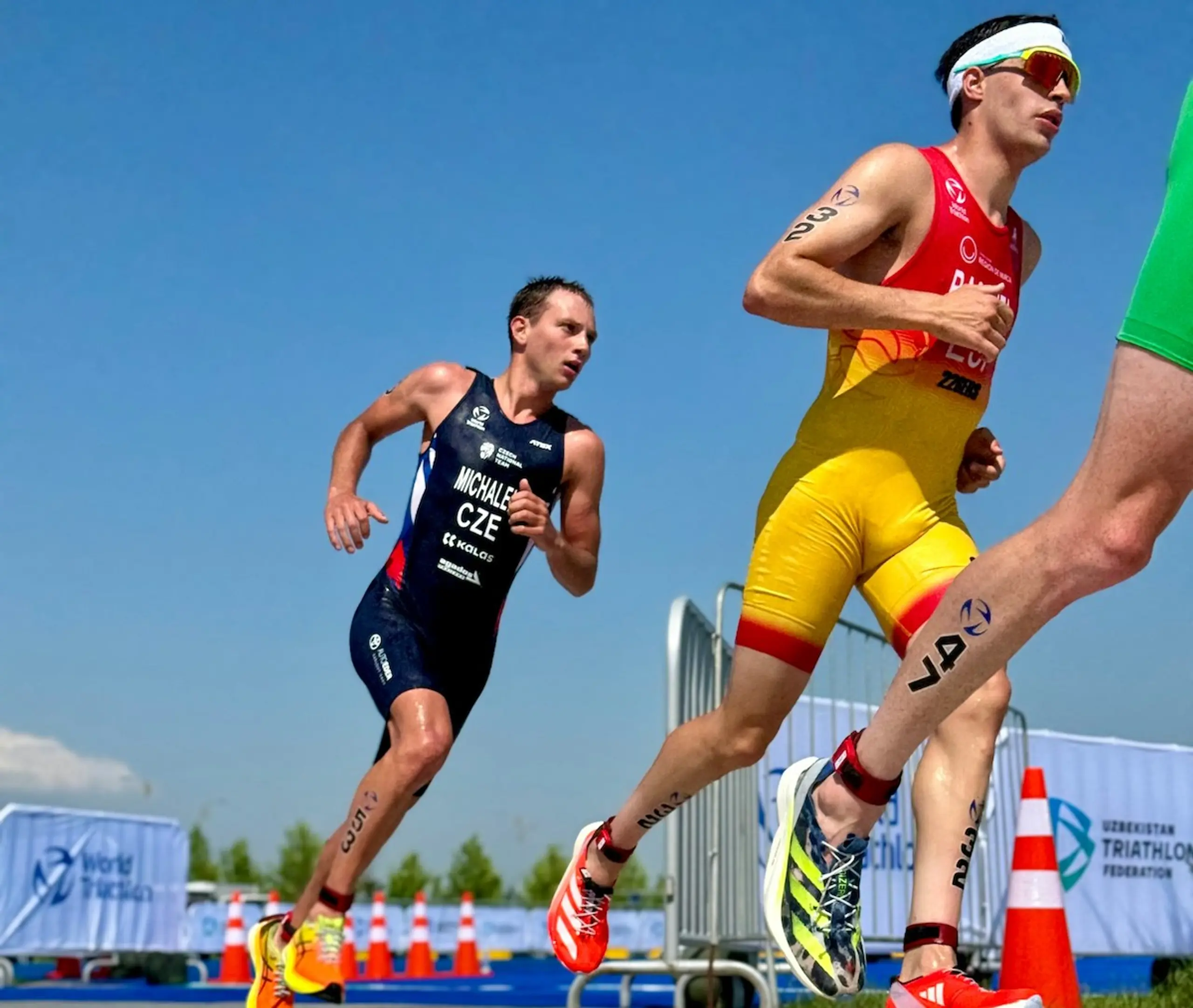 Three men running in a race