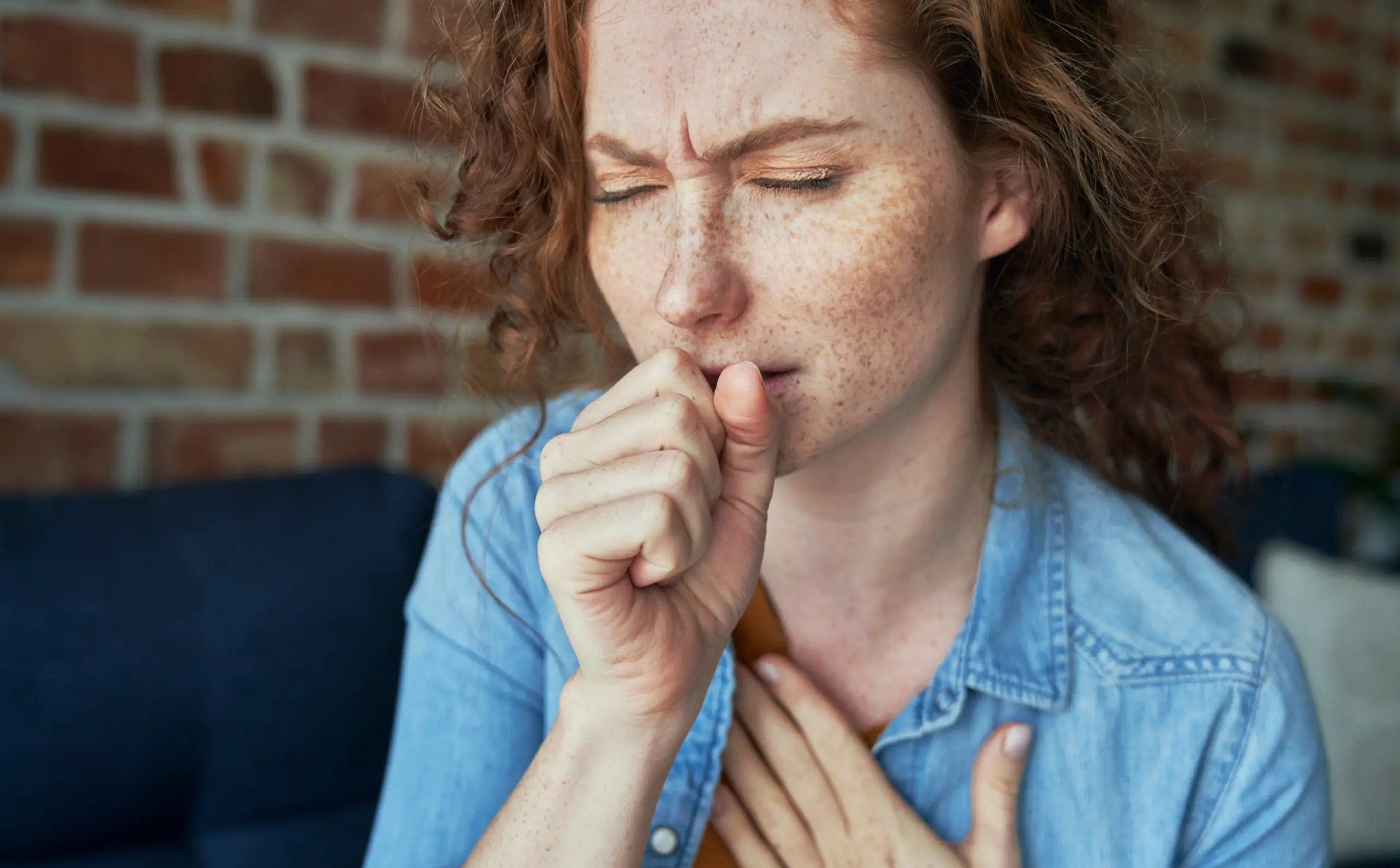 Woman coughing
