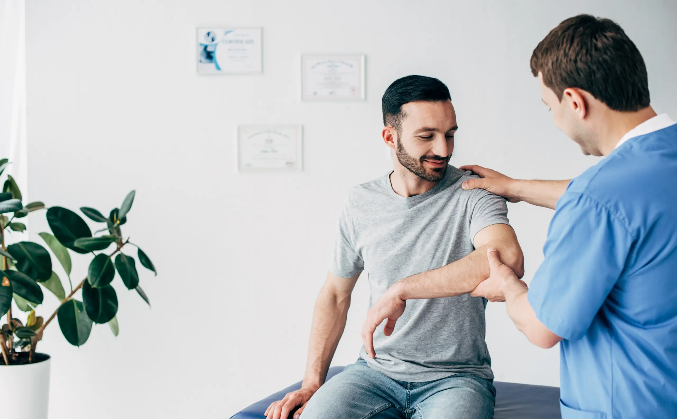 Doctor assesses arm pain