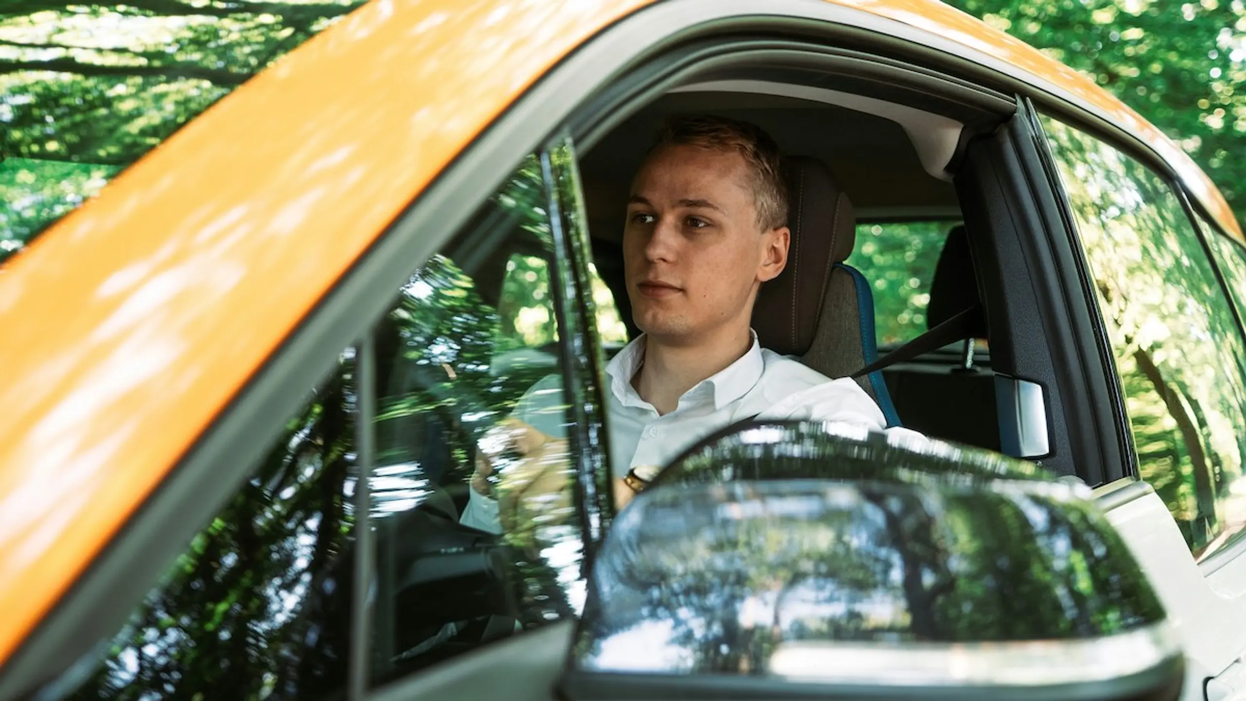 A man driving a car
