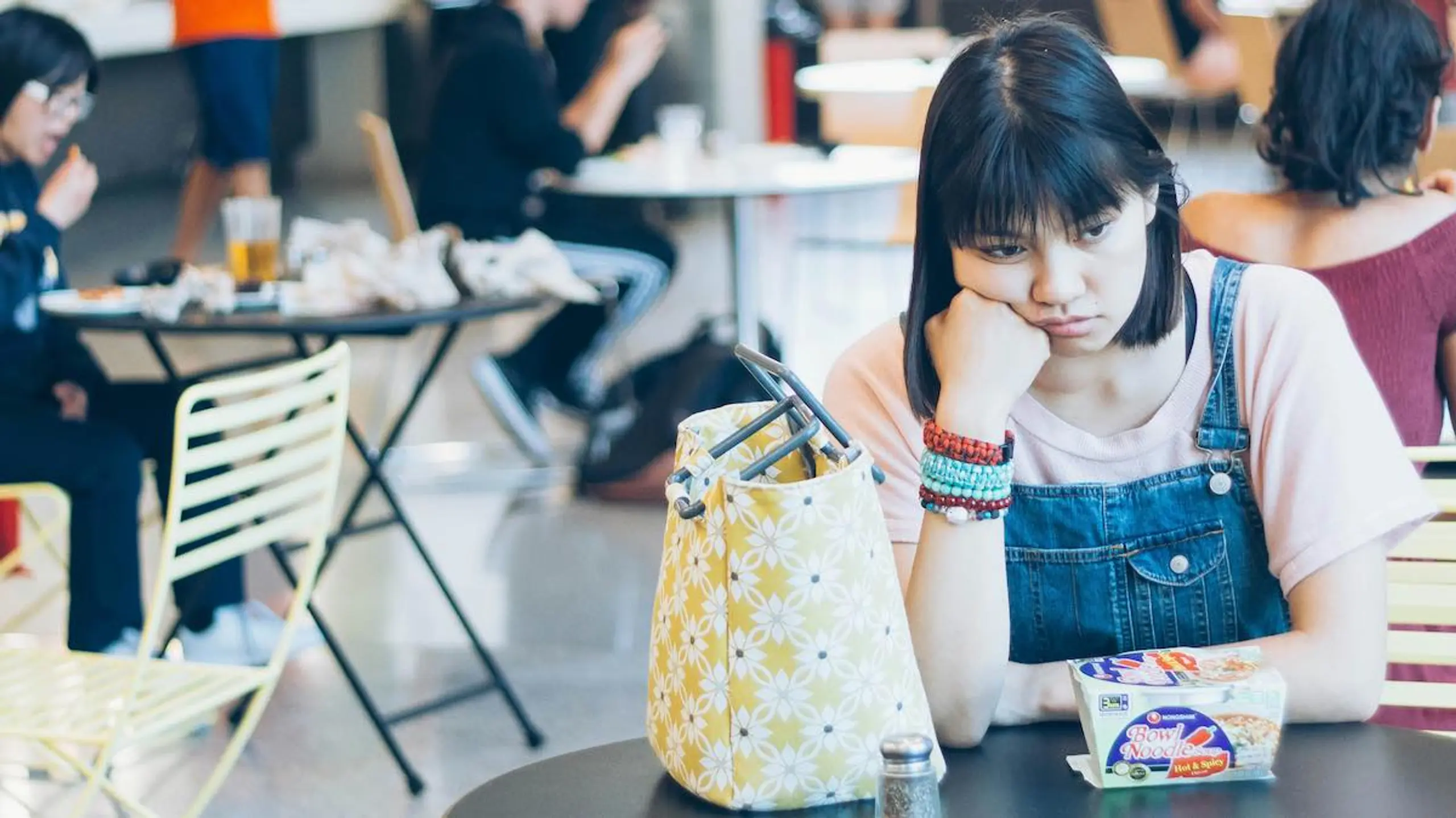 A woman in discomfort after eating