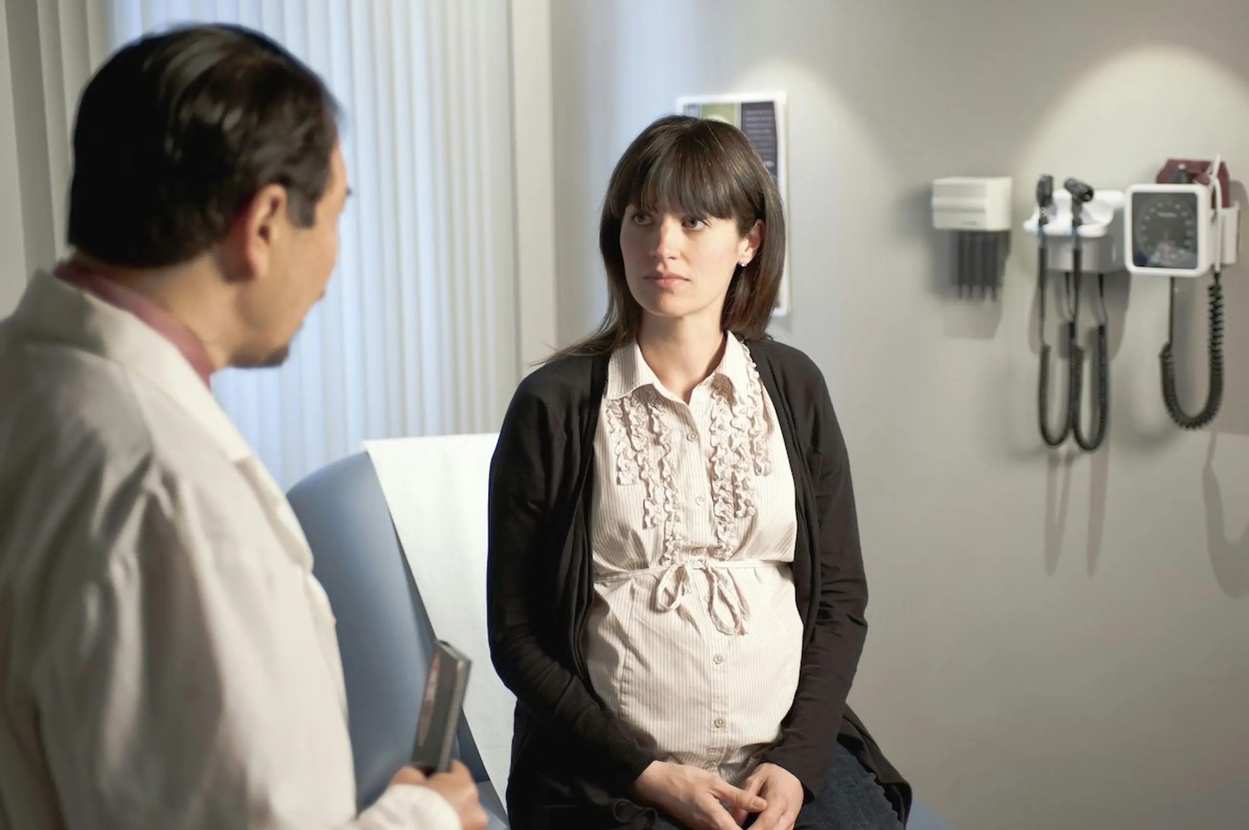 A pregnant woman at the doctor