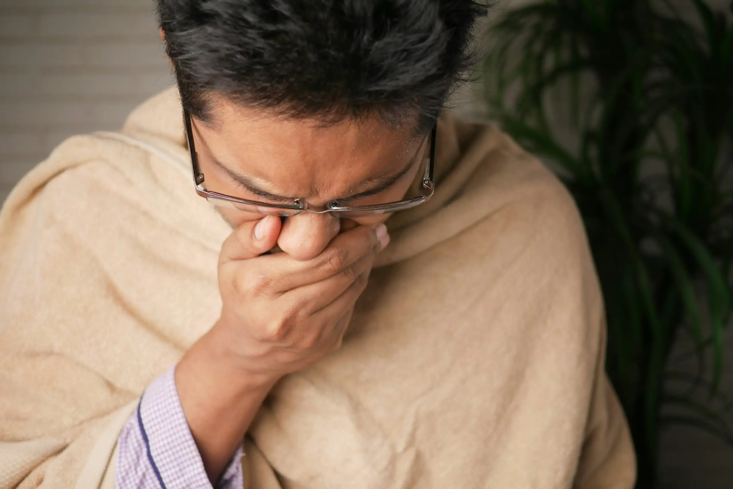 A guy who is coughing
