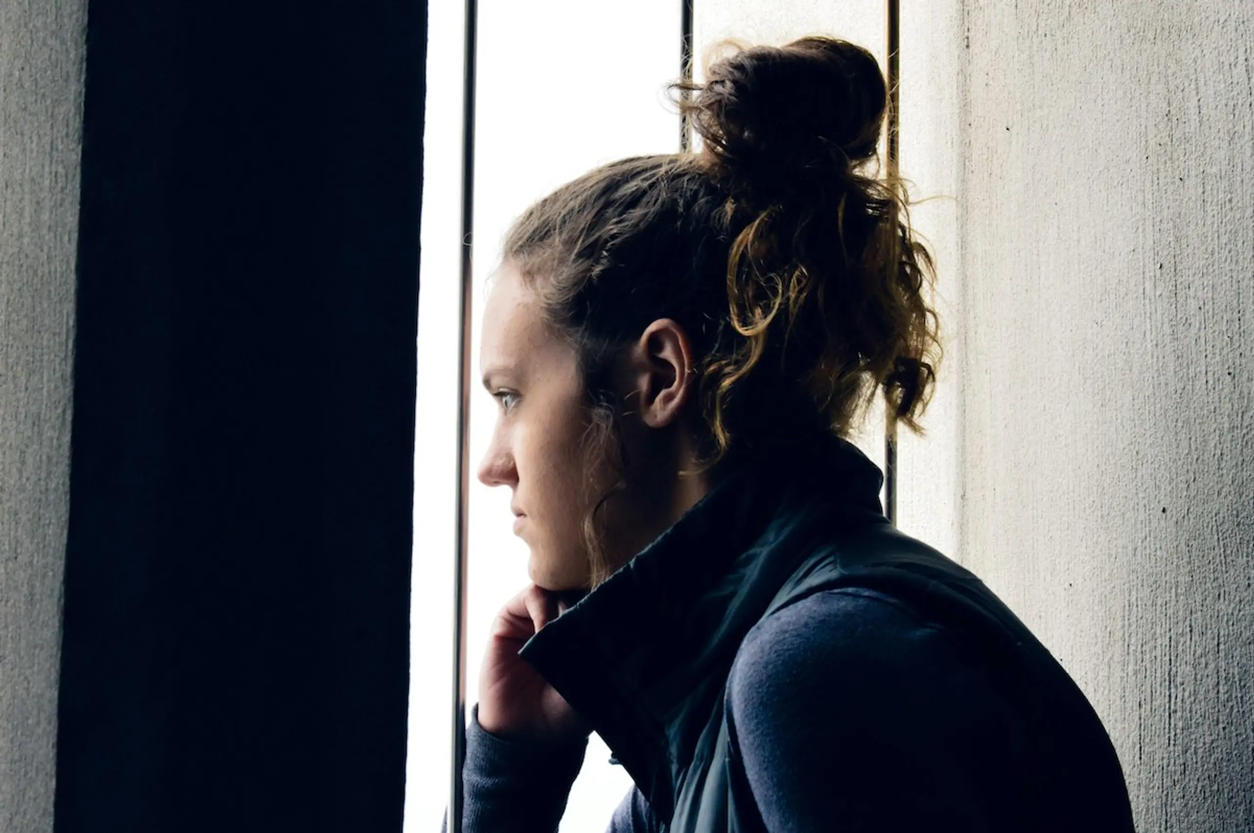 A woman staring out the window