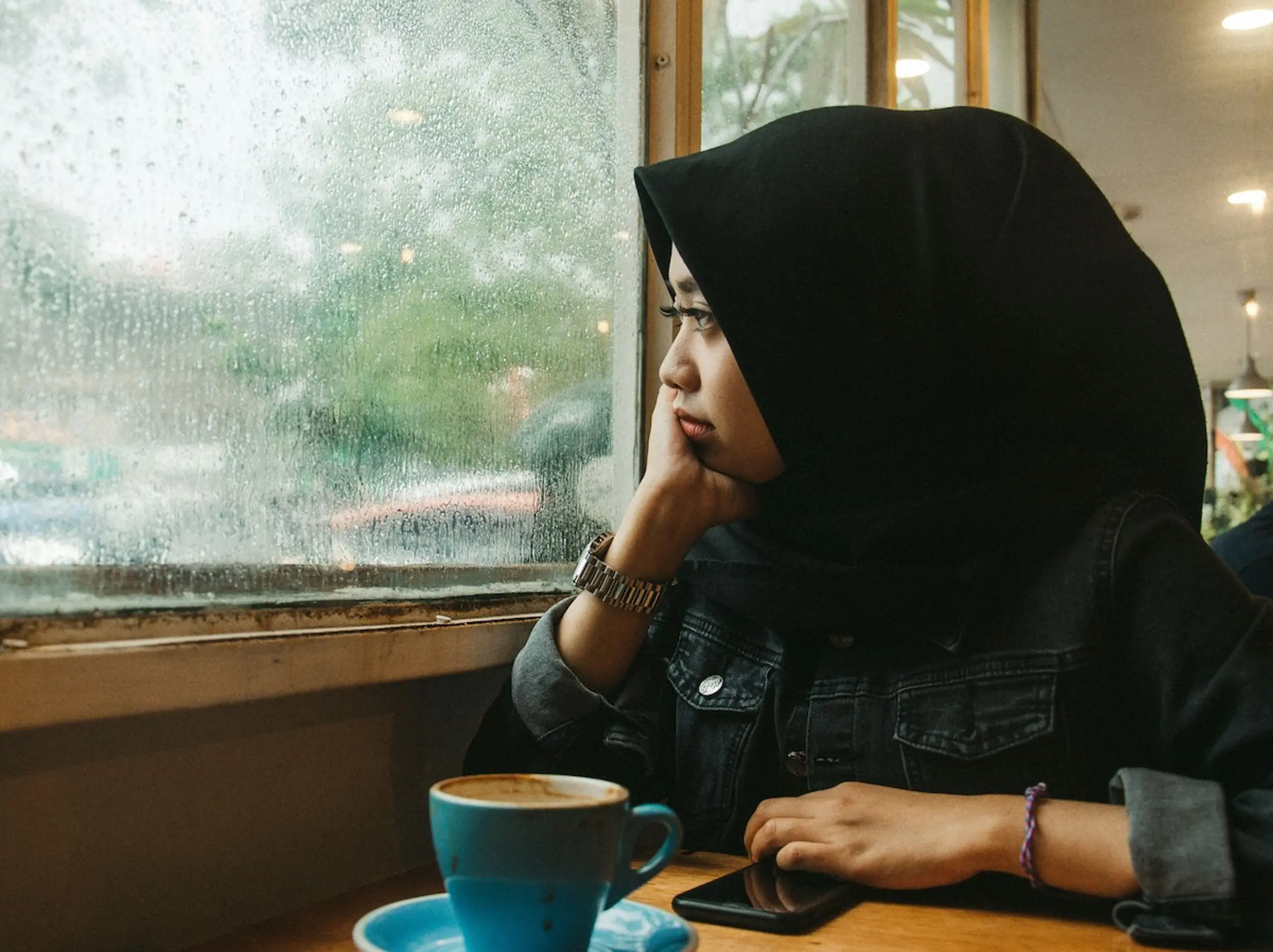 A woman looking out the window