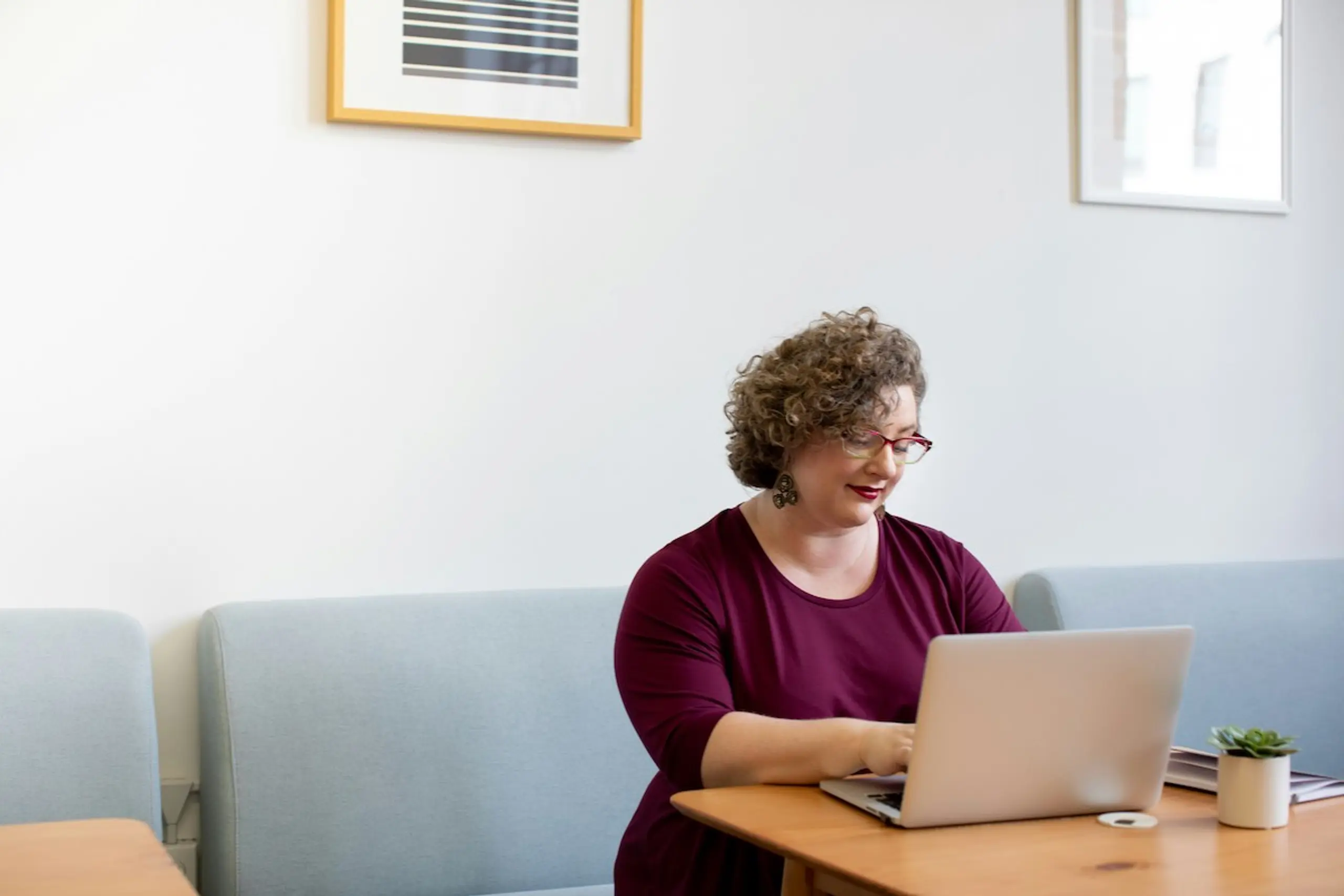 A woman typing on the computer