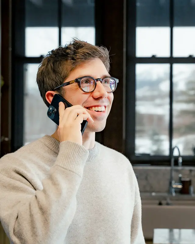 photo of a man on the phone