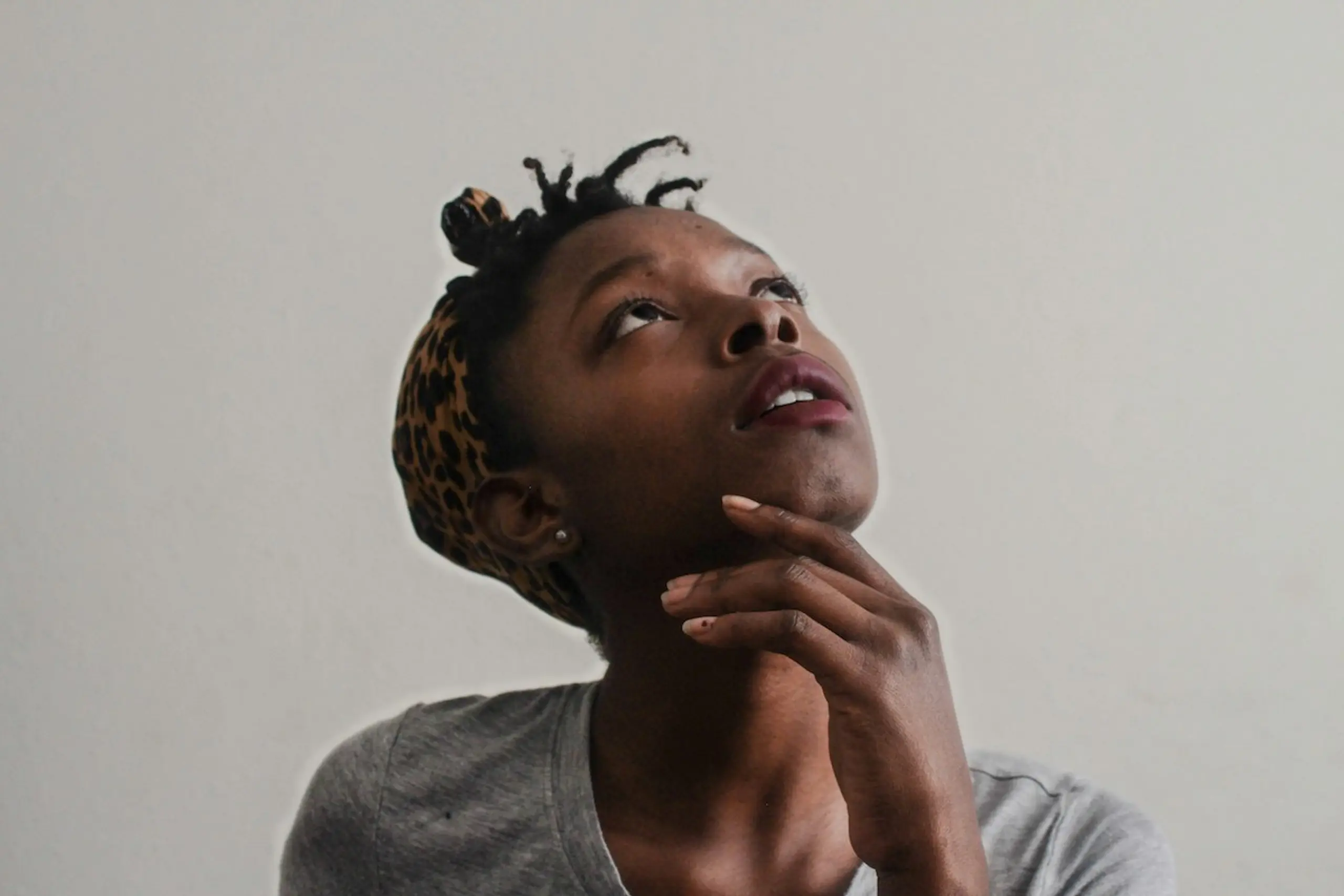 A stressed woman looking up