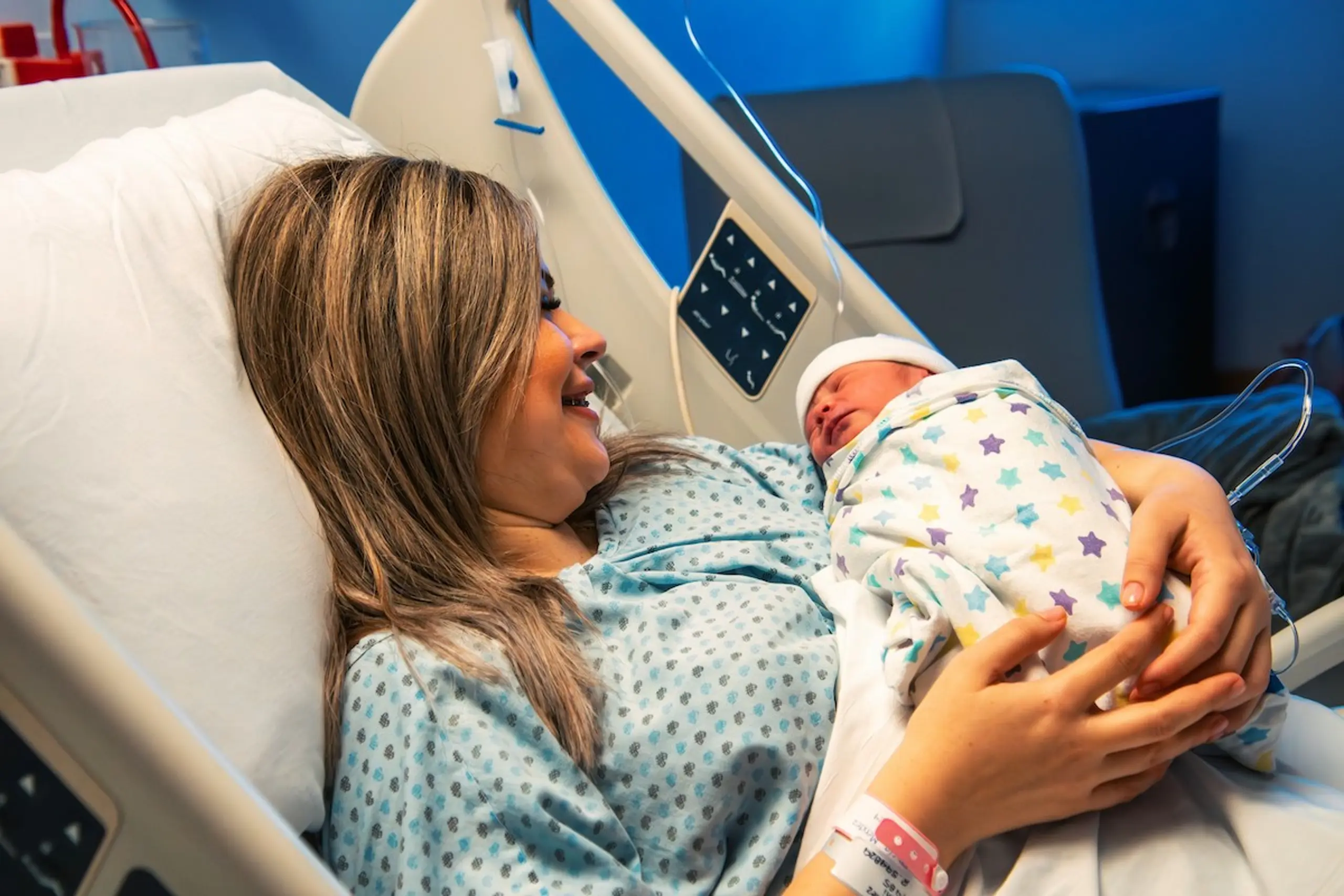 A woman after giving birth in the hospital