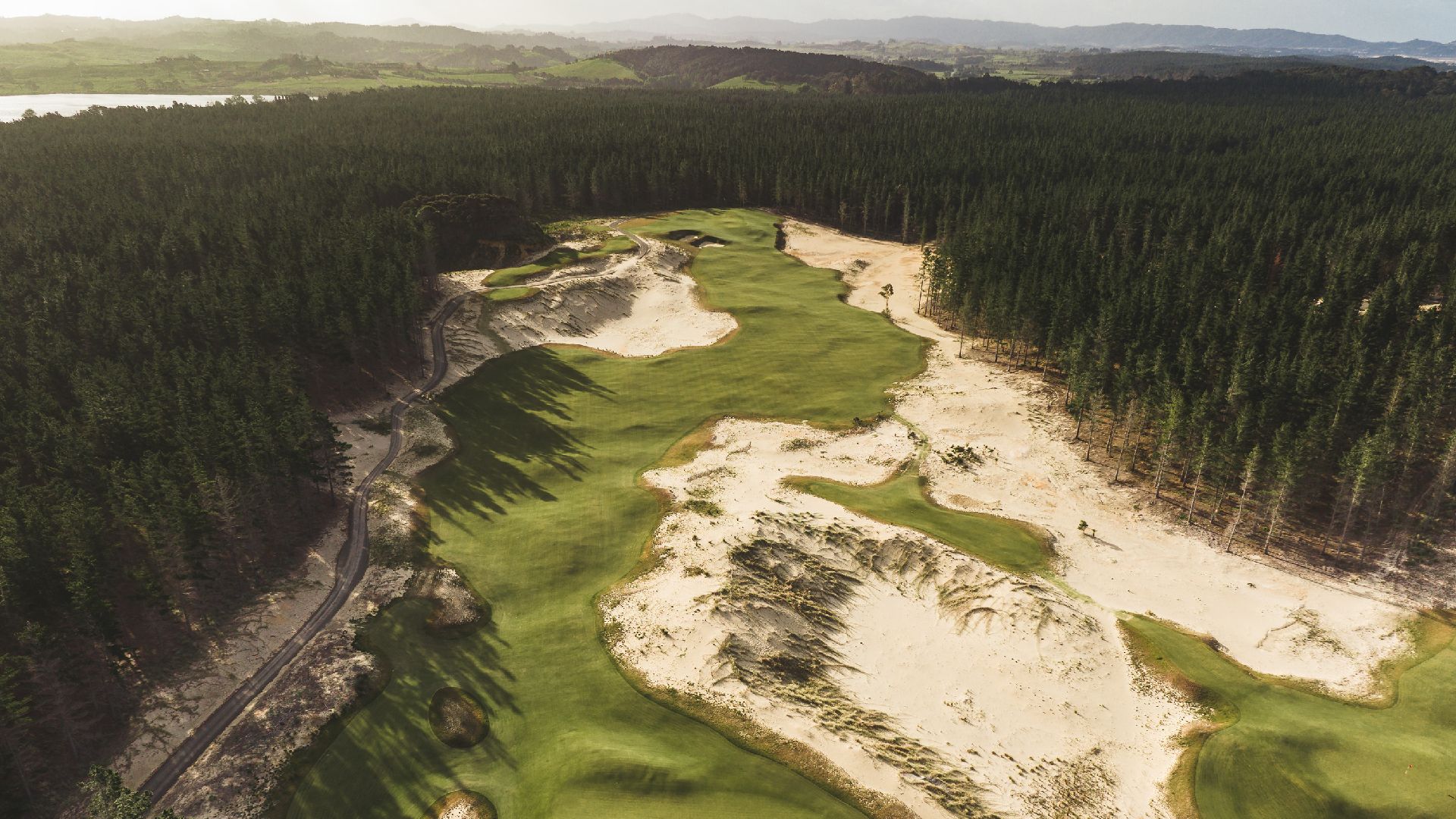 Aerial view of the spectacular coastal fairways at Te Arai Links, the premier luxury golf resort in Northland, New Zealand.