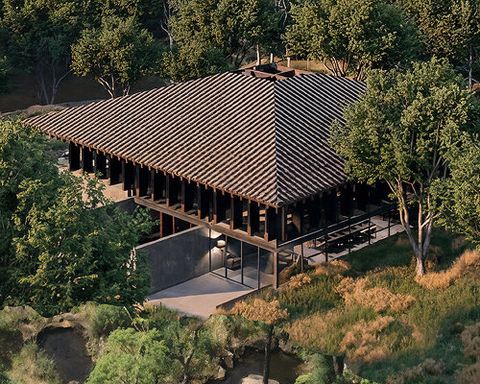 V taller proposes forest retreat around monolithic stone core for NOT A HOTEL in japan
