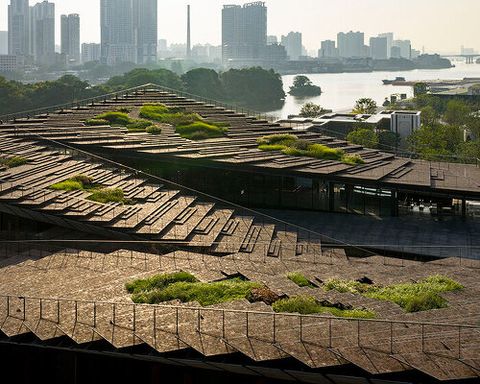 historic shipyard in china becomes walkable volcanic stone rooftop by kengo kuma