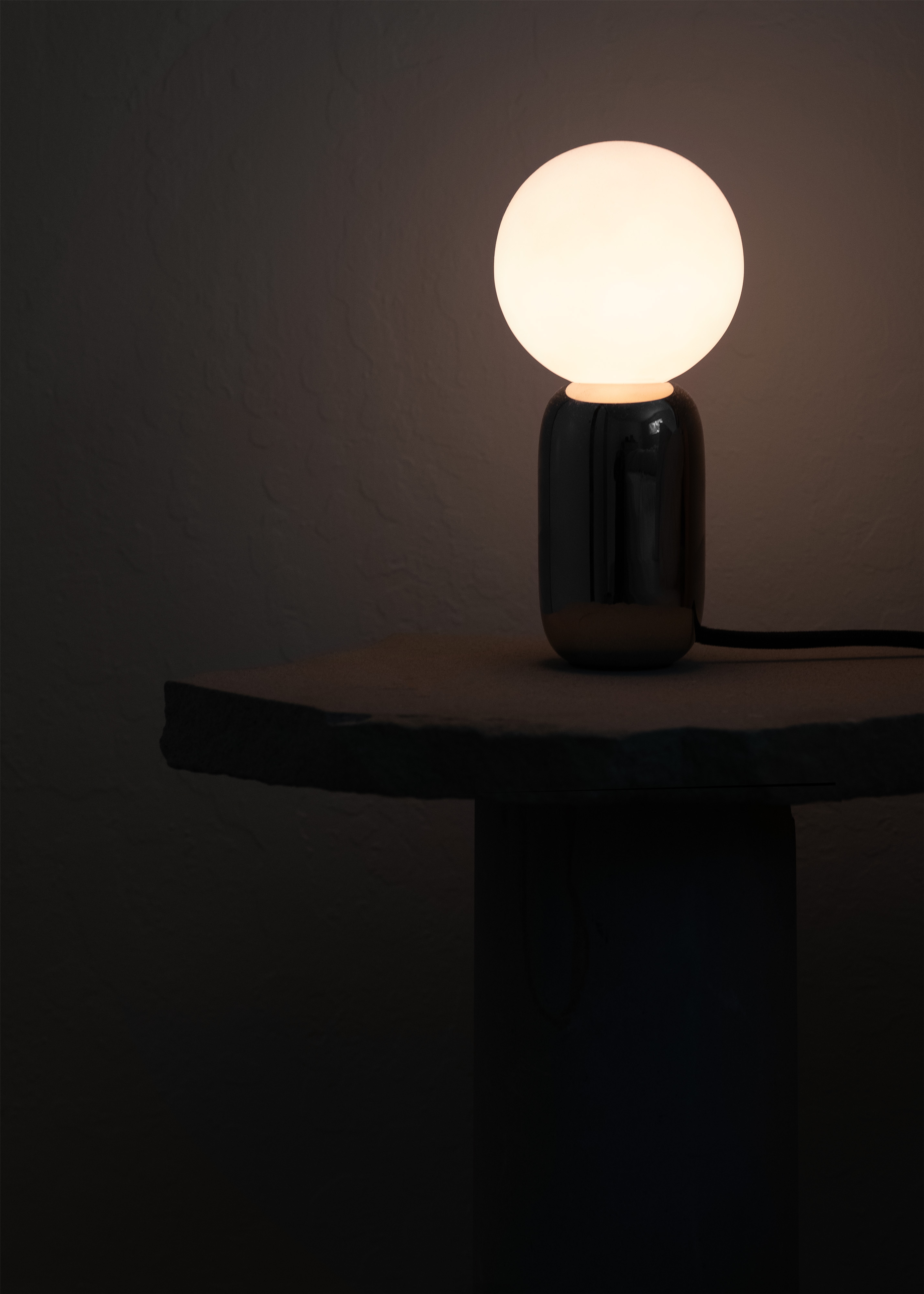 Bubble lamp on side table
