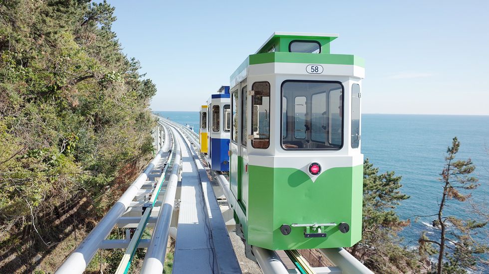 Ride the Haeundae Blueline Park Beach Train for a scenic coastal view.