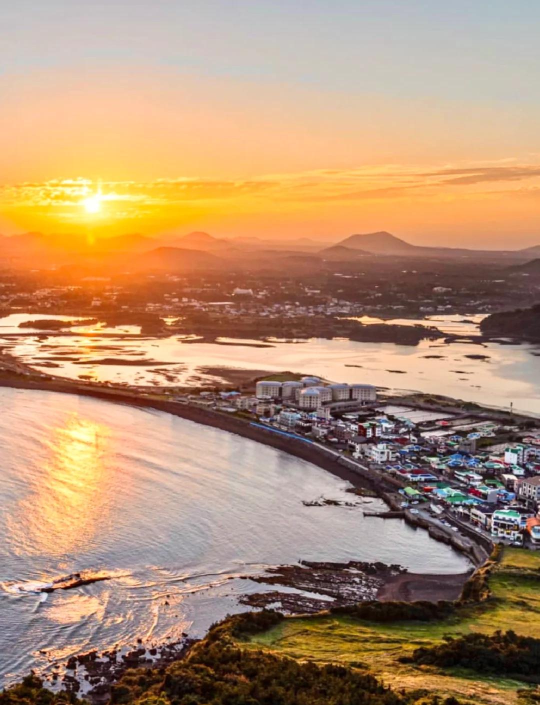 Catch the sunrise at Seongsan Ilchulbong Peak.